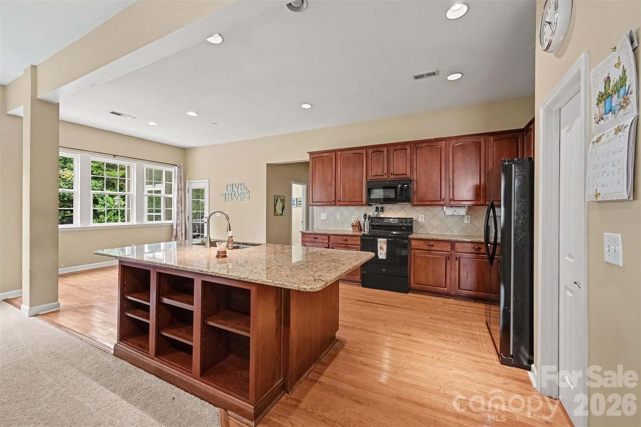 Single Family Residence at 9883 NW Darby Creek Avenue NW, Concord, photo 2 of 37