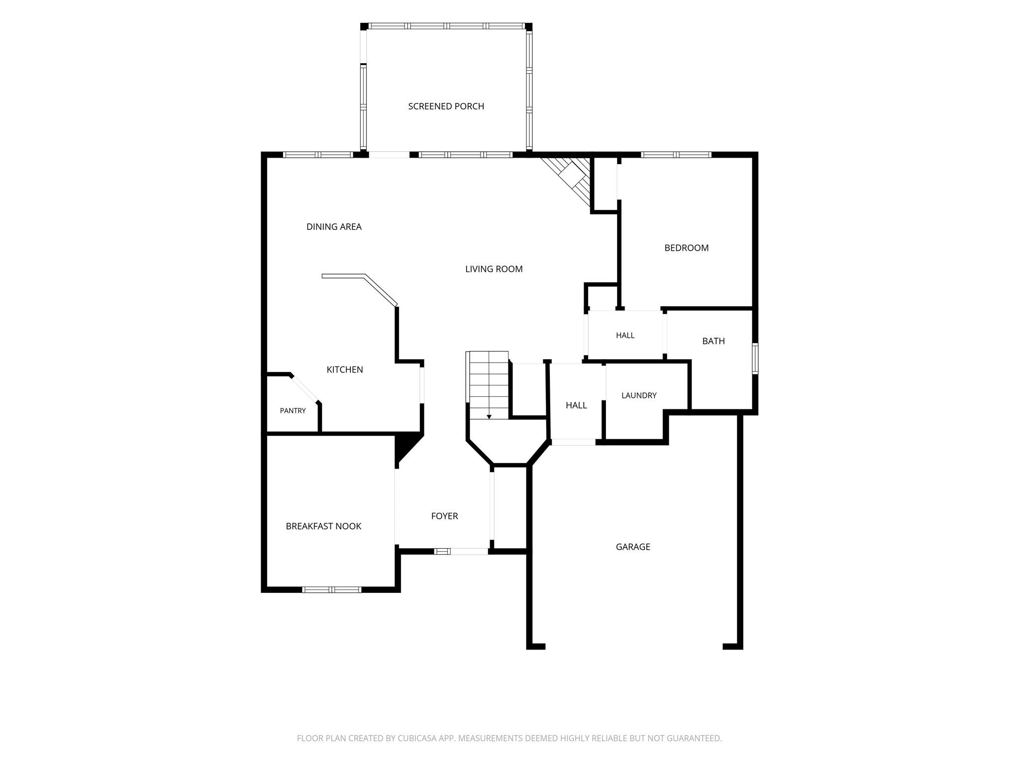 First-floor plan highlights an open kitchen and living area, formal dining room, main-level guest bedroom with nearby full bath, laundry room, four-seasons room, and attached two-car garage - 10345 Scotland Avenue, Indian Land