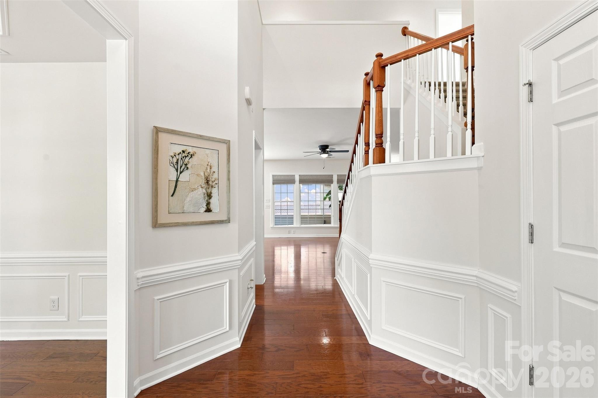 Impressive two-story foyer welcomes you with gleaming hardwood floors and elegant picture-frame molding - 10345 Scotland Avenue, Indian Land
