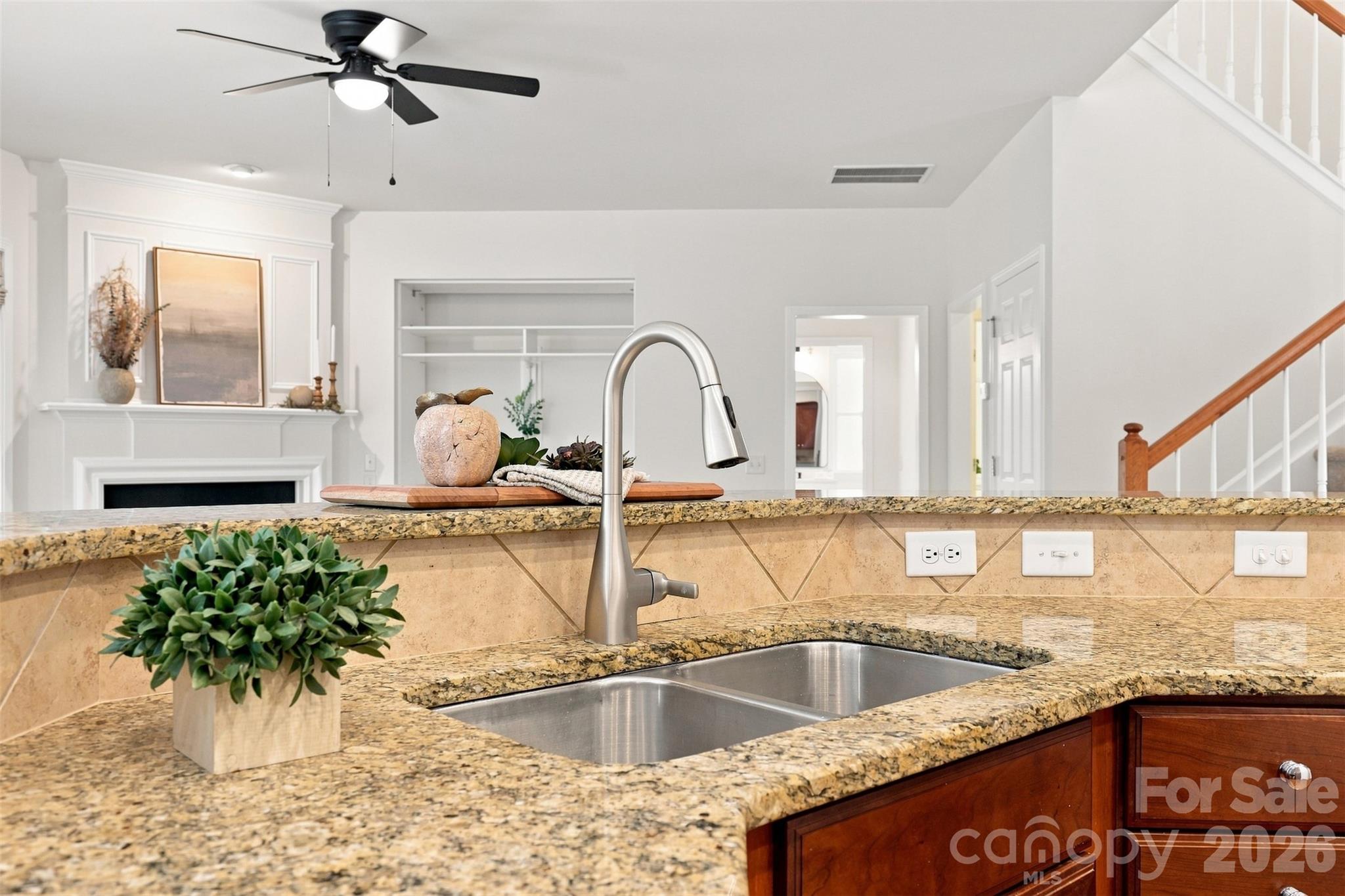 Double-basin sink with a garbage disposal provides added convenience for meal preparation and everyday cleanup - 10345 Scotland Avenue, Indian Land