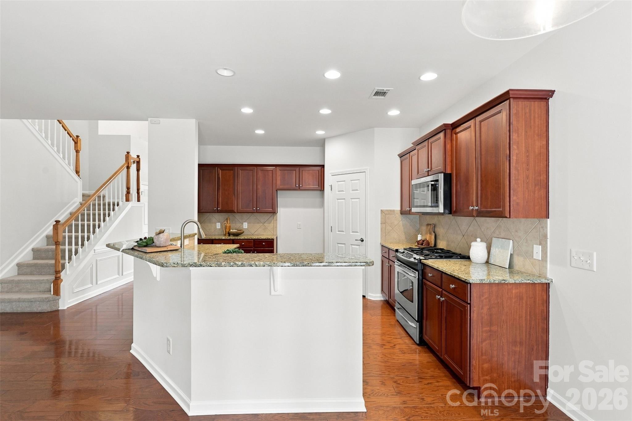 Open-concept design keeps the kitchen connected to the main living areas, with a practical layout - 10345 Scotland Avenue, Indian Land