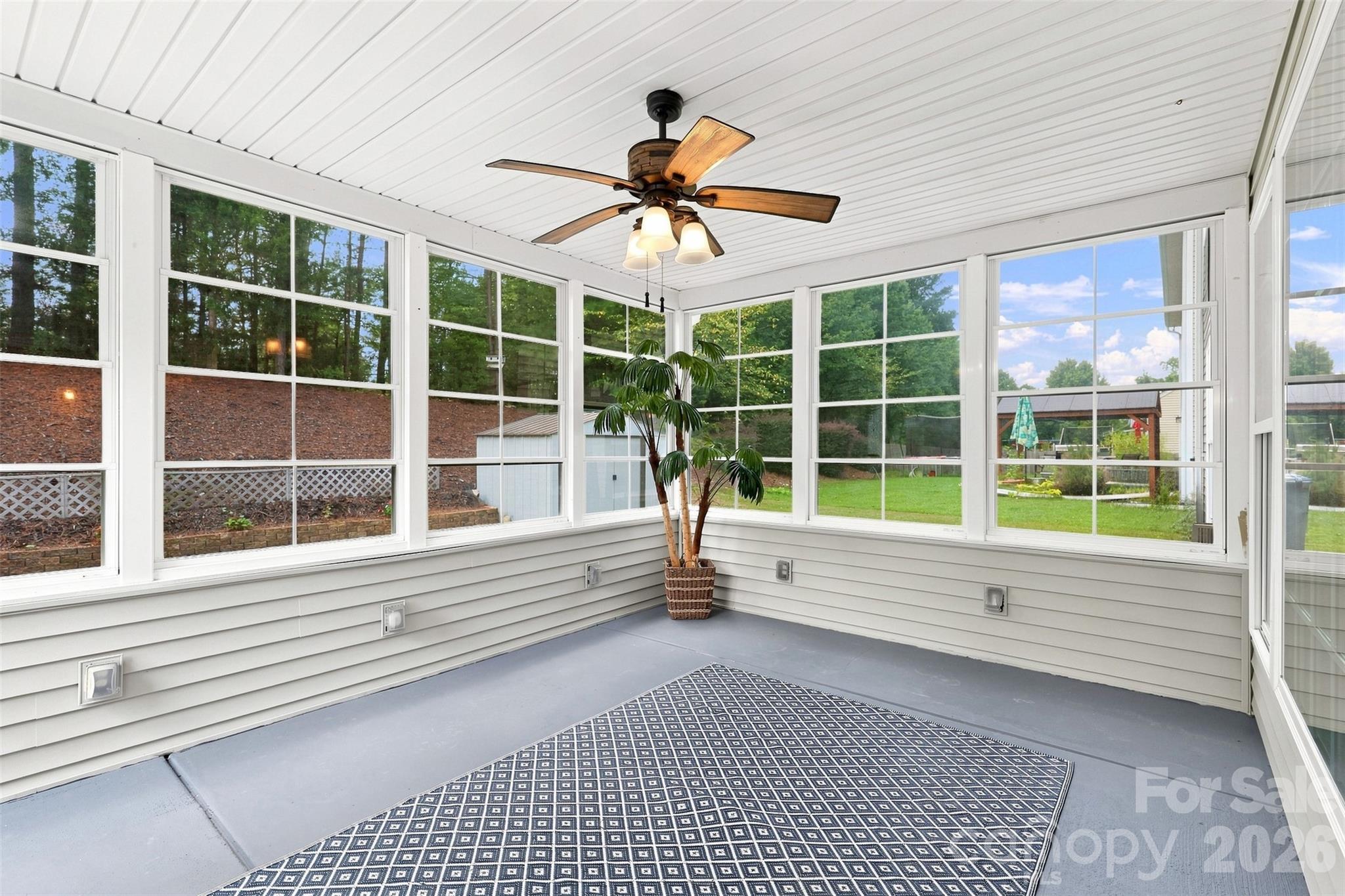 Enjoy the backyard setting in greater comfort throughout the seasons - 10345 Scotland Avenue, Indian Land
