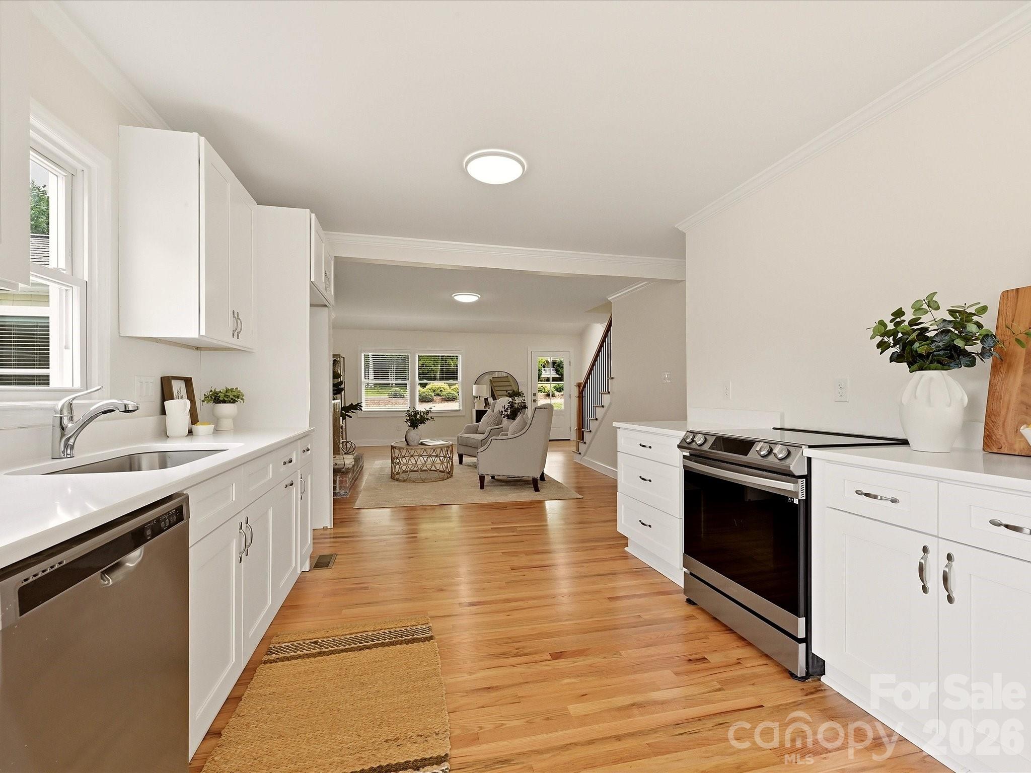 Updated kitchen ready for your vision! Keep open, add additional cabinets or wood shelves for additional character! - 20845 Lagoona Drive, Cornelius