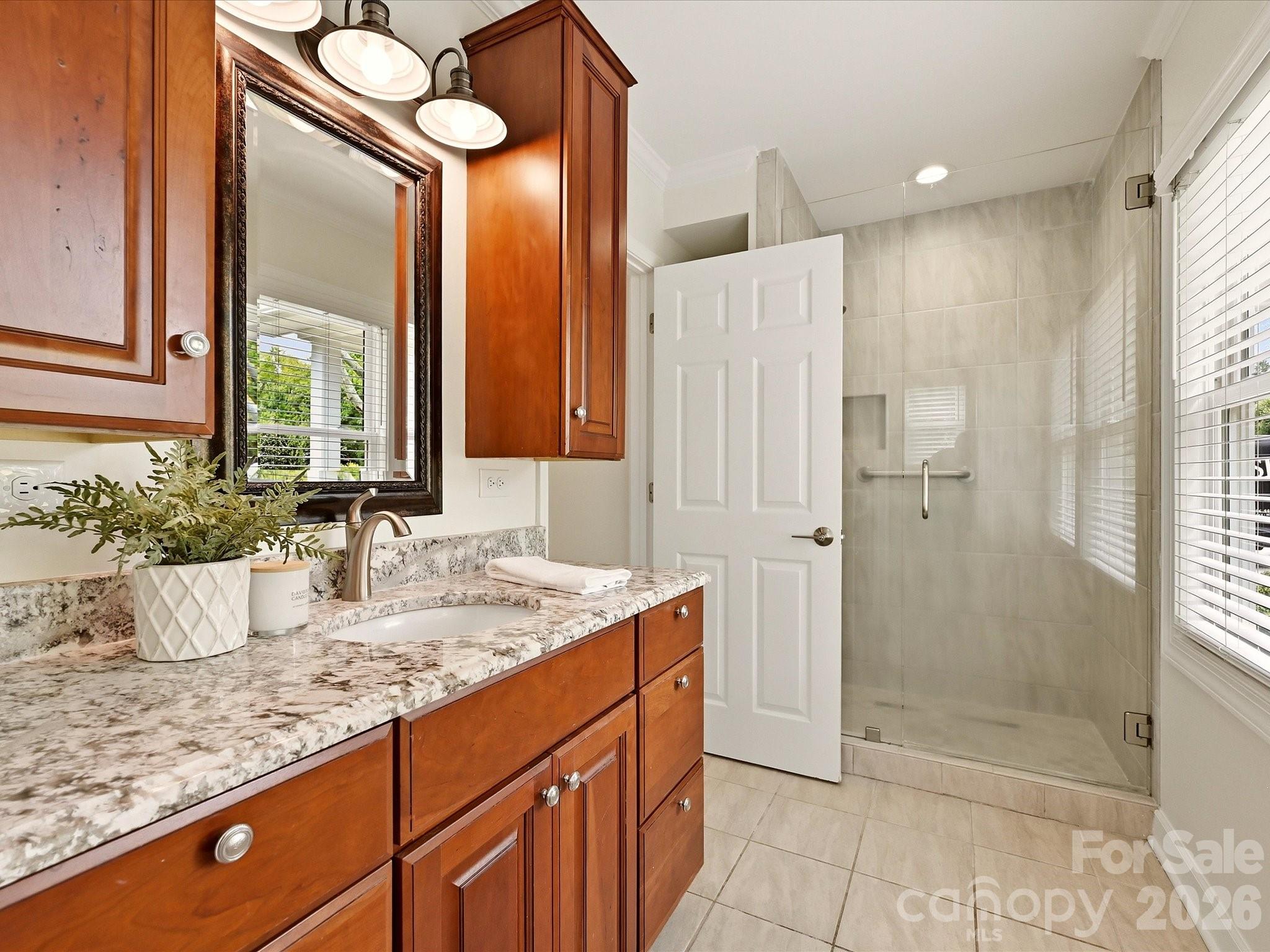 Primary bathroom with granite counters and private shower! - 20845 Lagoona Drive, Cornelius