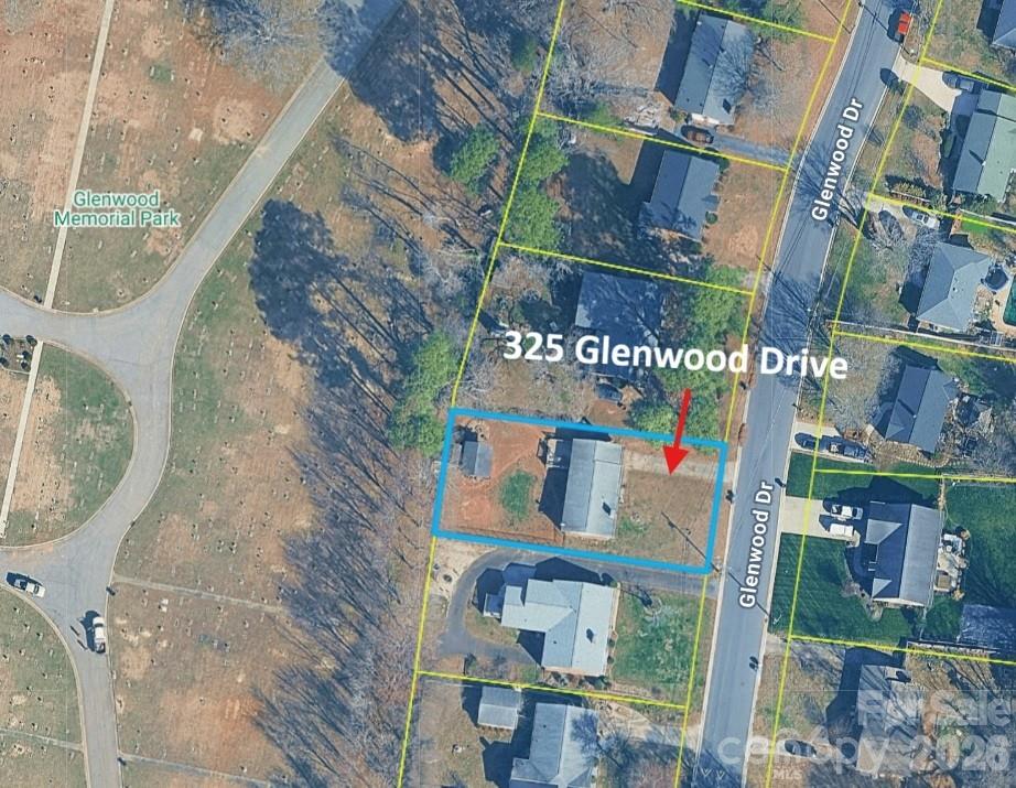 The property offers a peaceful, private setting on a dead-end street and backs up to a cemetery with mature trees and a clear view! - 325 Glenwood Drive, Mooresville