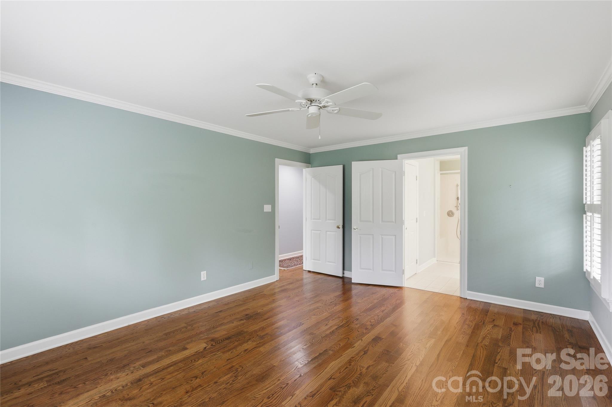 Primary bedroom offers a private retreat - 18 Creekside Way, Asheville