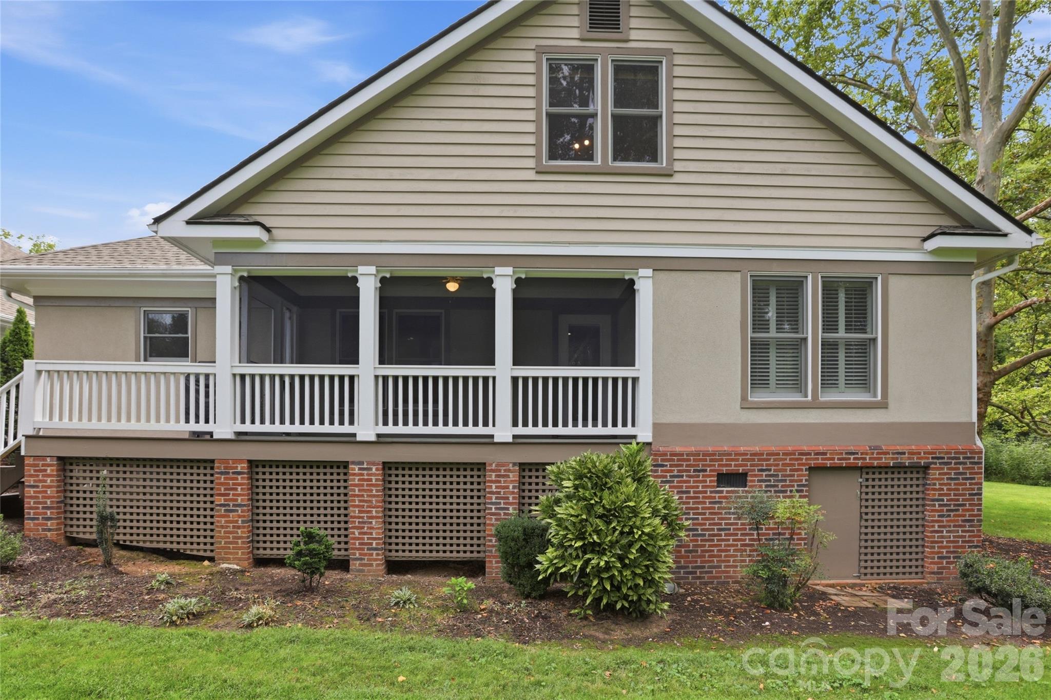 Rear exterior with full stand up encapsulated crawl space - 18 Creekside Way, Asheville