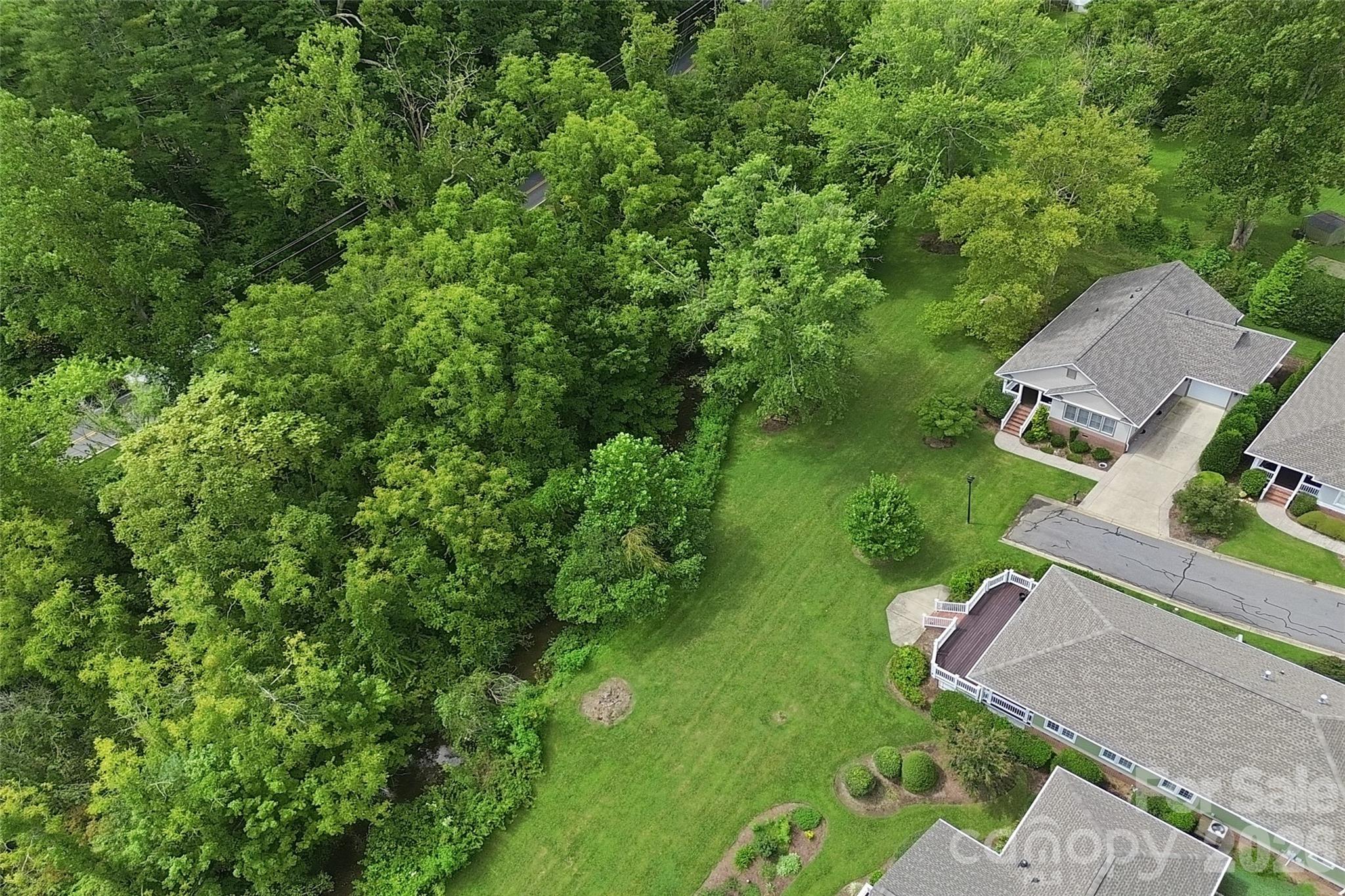 Community property adjoins home and clubhouse - 18 Creekside Way, Asheville