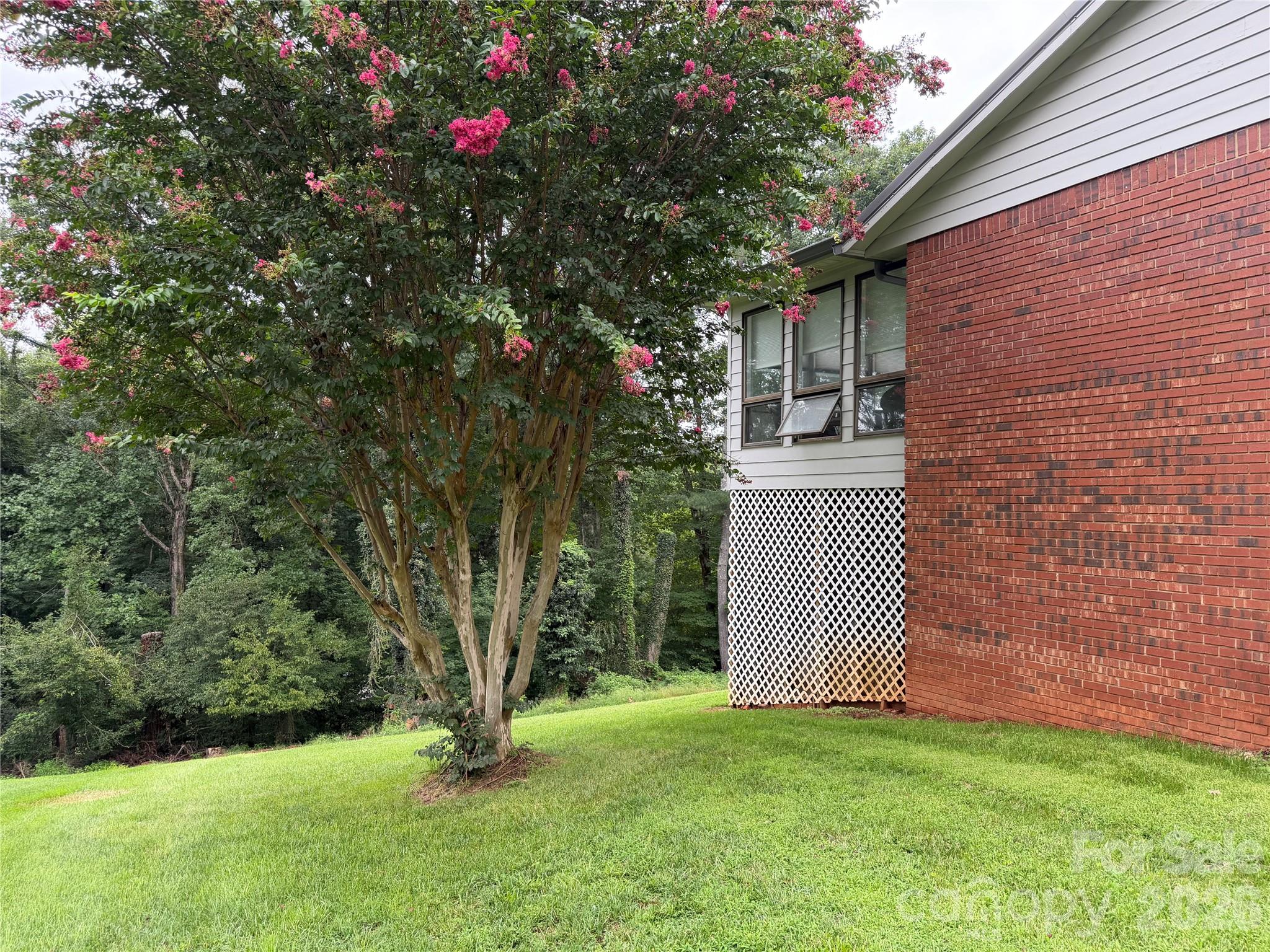 Back Left side showing corner of Sun Room/Porch - 1000 Beaumont Poplar Street, North Wilkesboro