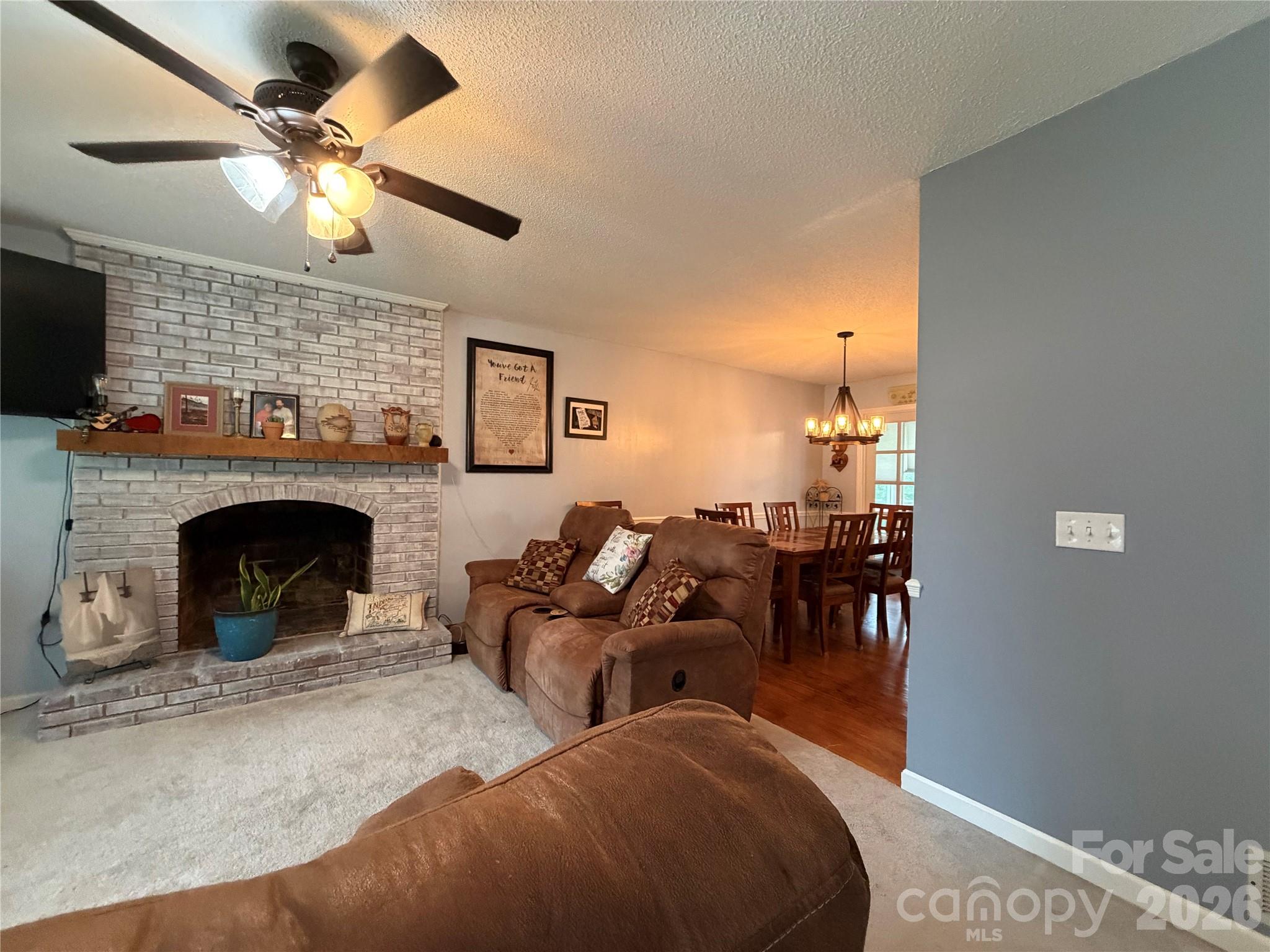 Living Room from Entry with Dining Roommates to right - 1000 Beaumont Poplar Street, North Wilkesboro