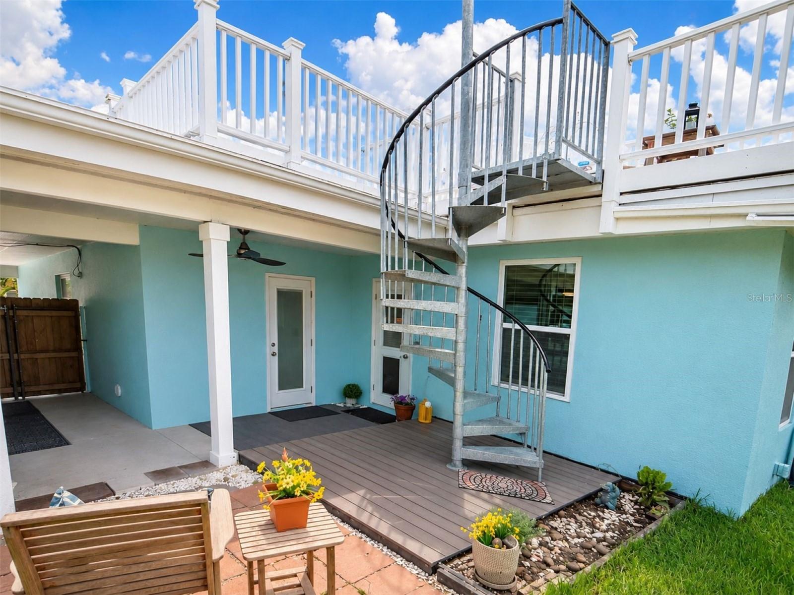 Spiral staircase leads to the home's charming widow's walk with water views and a 360-degree vantage point. - 7891 4TH AVE S, ST PETERSBURG