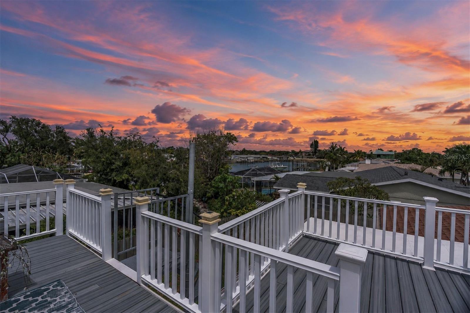 West-facing views from the widow's walk provide a front-row seat to spectacular Florida sunsets. - 7891 4TH AVE S, ST PETERSBURG