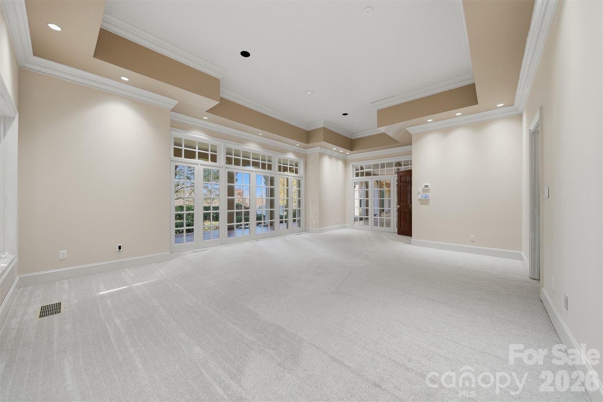 Luxury primary suite with spacious layout and elegant architectural detailpa-inspired primary bathroom featuring dual vanities, walk-in shower, and luxury finishes. - 3619 Links Drive NE, Conover