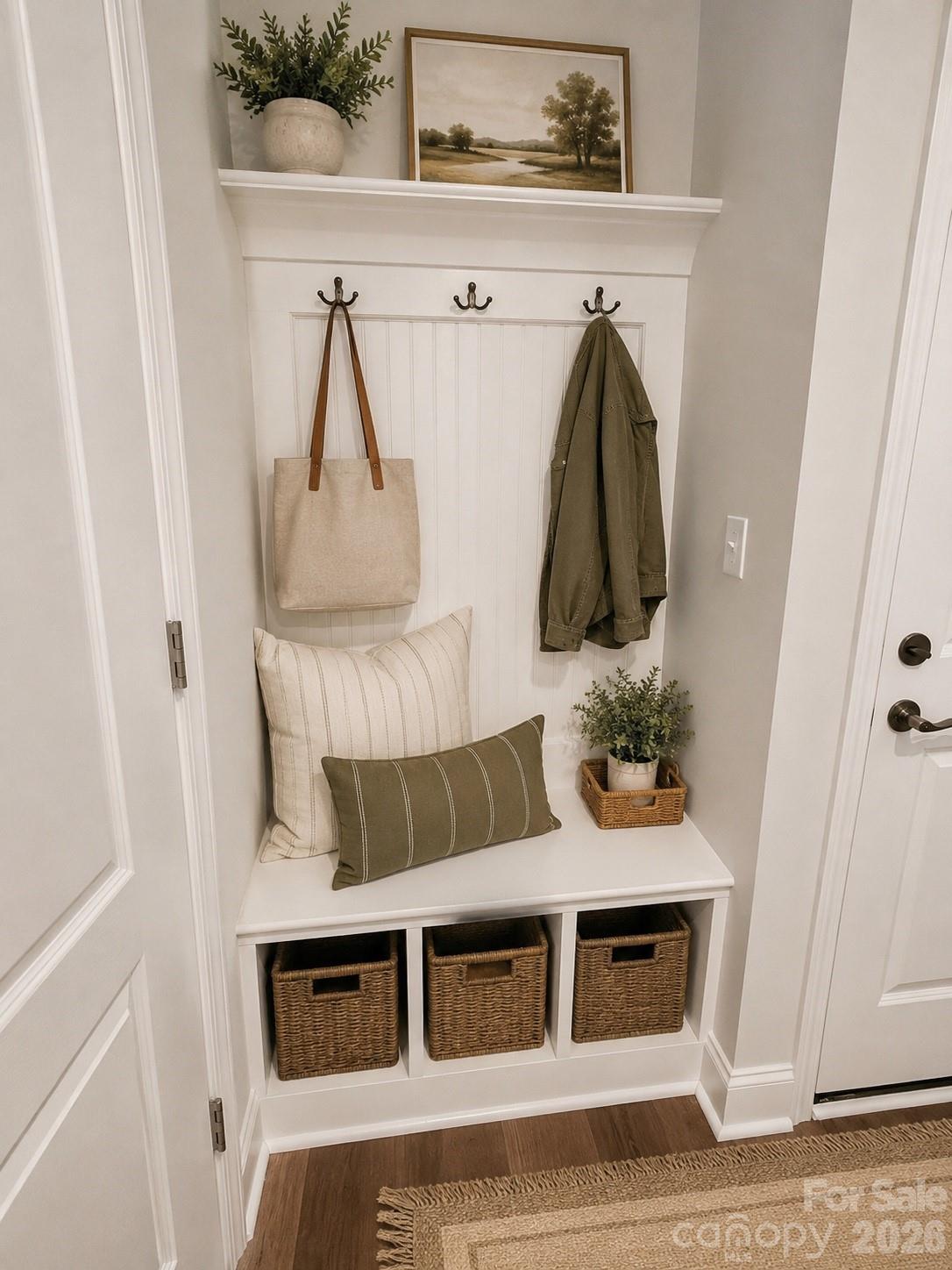 The DROPZONE is conveniently located off of the garage. Coat closet and convenient work from home space is also here. (this image has been virtually staged) - 1318 Poppy Way, Matthews