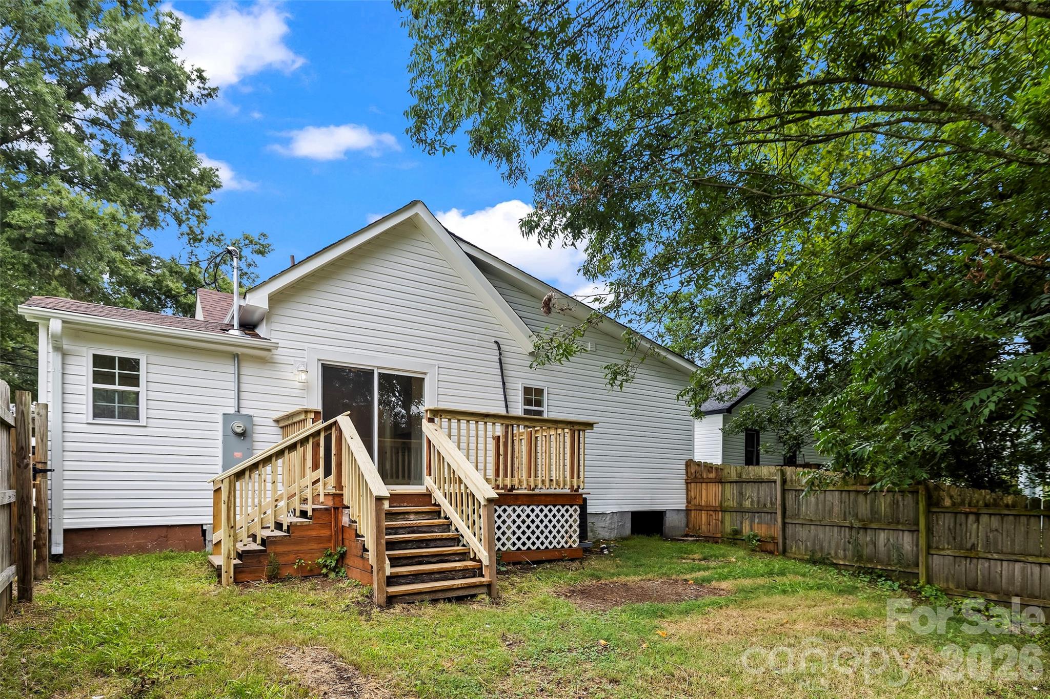 back of house, deck anf fenced backyard - 605 Kings Mountain Street, Clover