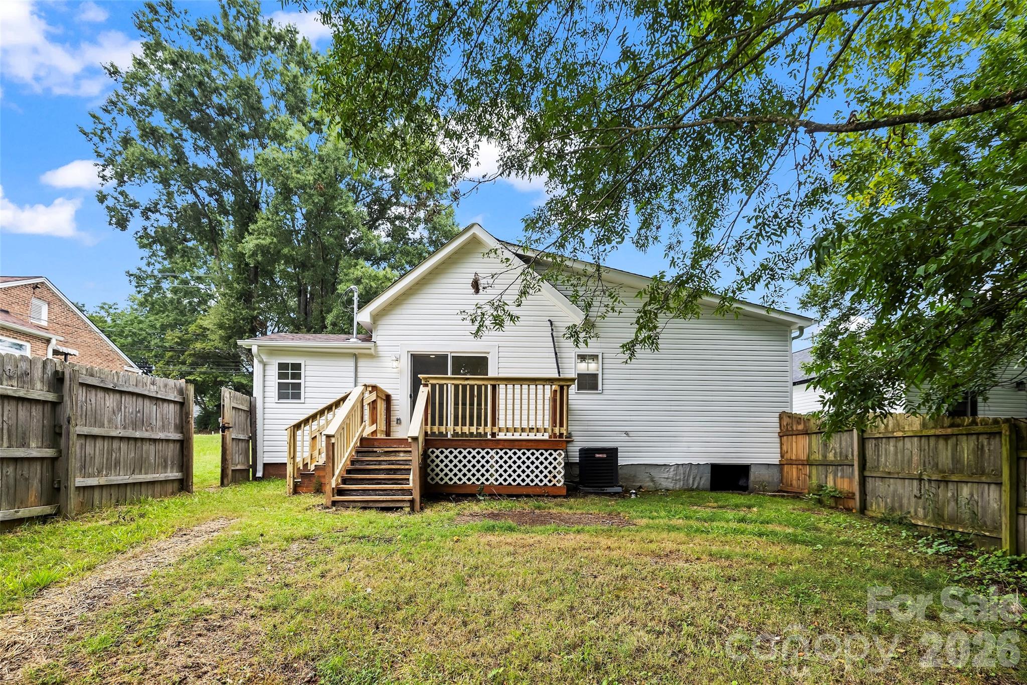 back of house, deck and fenced backyard - 605 Kings Mountain Street, Clover