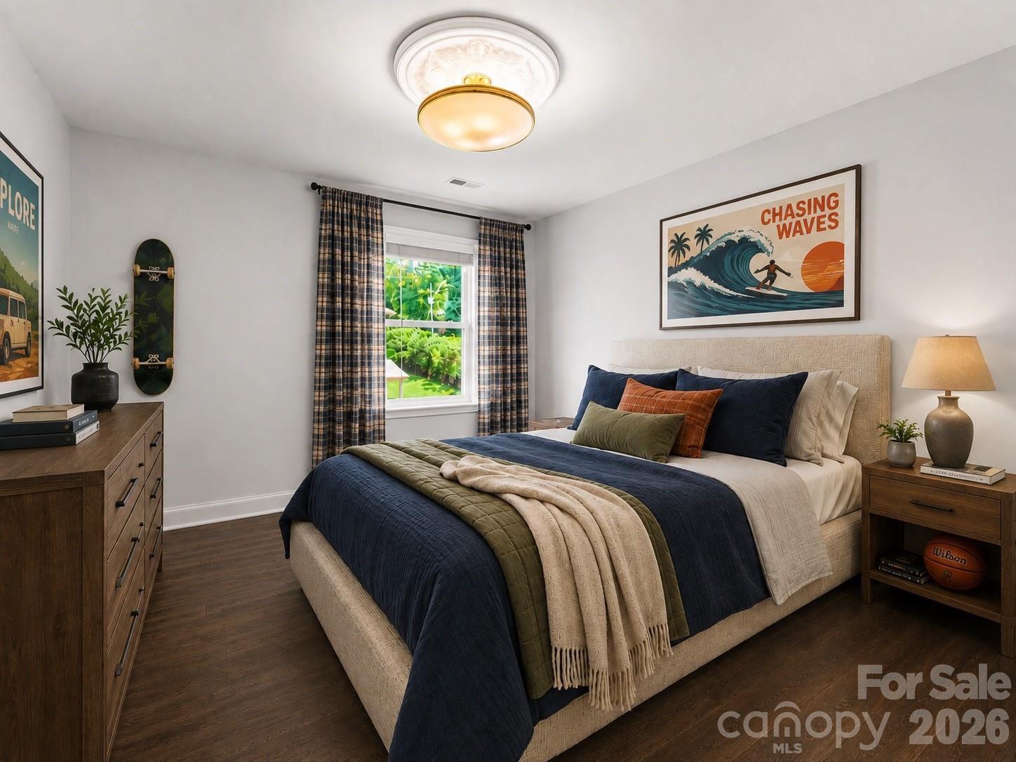 Bedroom 2 features laminate flooring, freshly painted neutral walls, a walk-in closet, and an upgraded lighting package. (virtully staged) - 1318 Poppy Way, Matthews