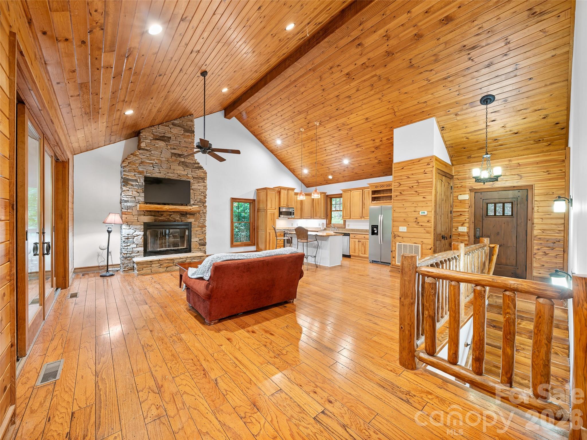 LIVINGROOM WITH VAULTED T&G CEILING - 47 Falls Crossing Road, Burnsville