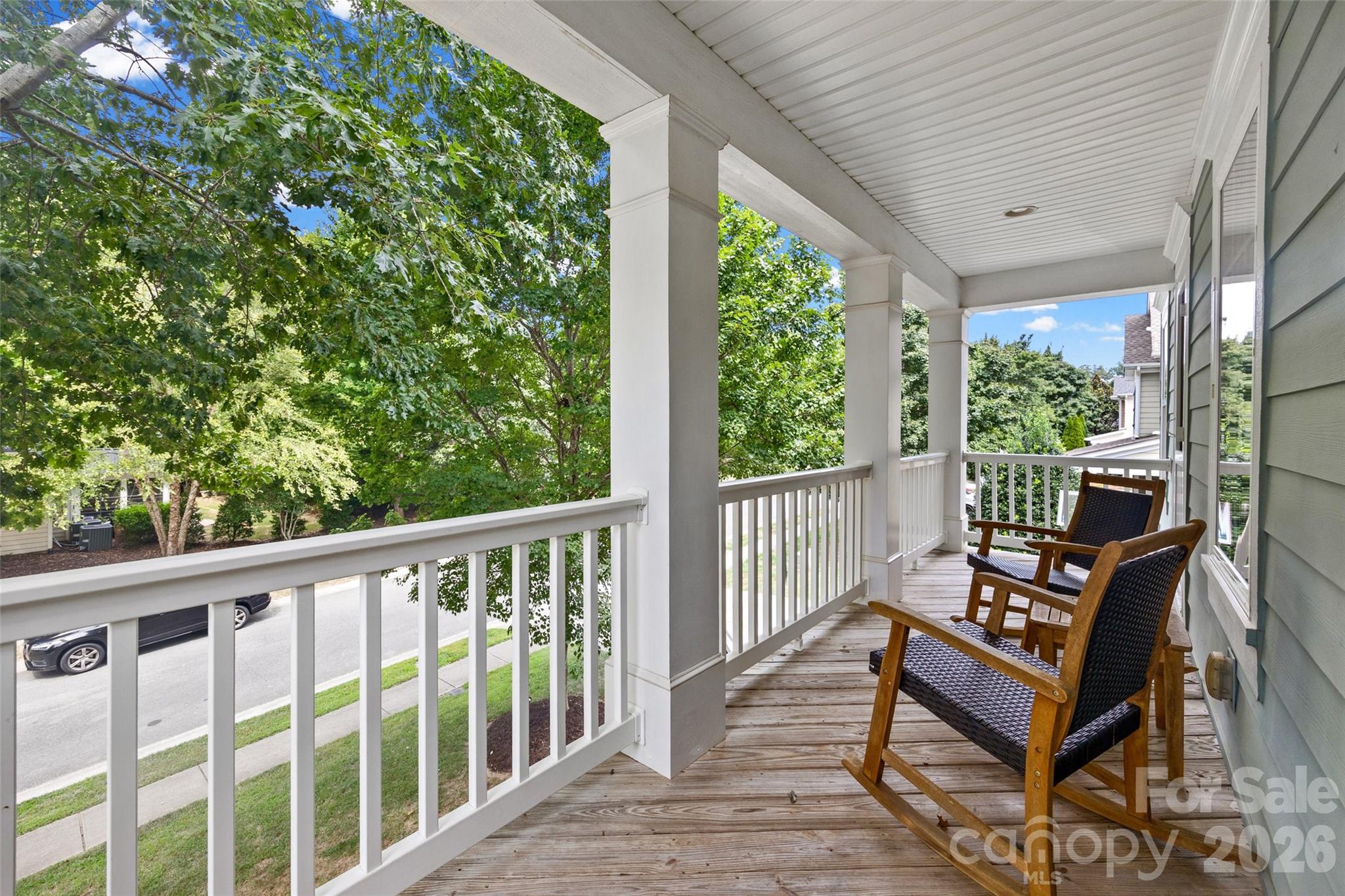 Charming balcony on front of house accessible from bedrooms 5 and 6 - 2209 Trading Ford Drive, Waxhaw