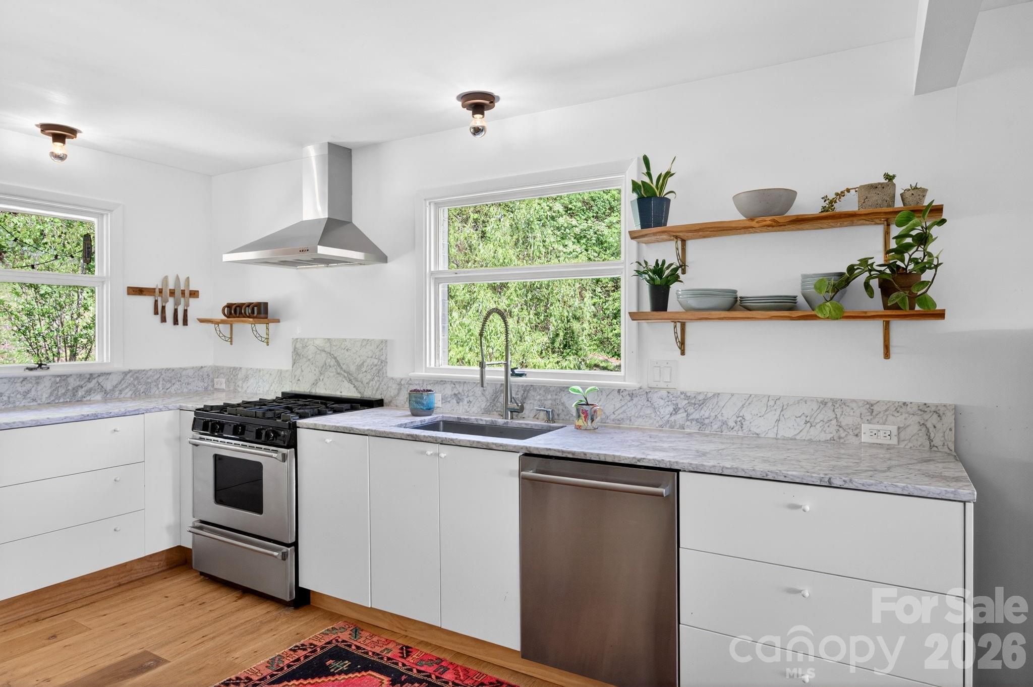 Modern Kitchen with Marble countertops - 301 Stratford Road, Asheville