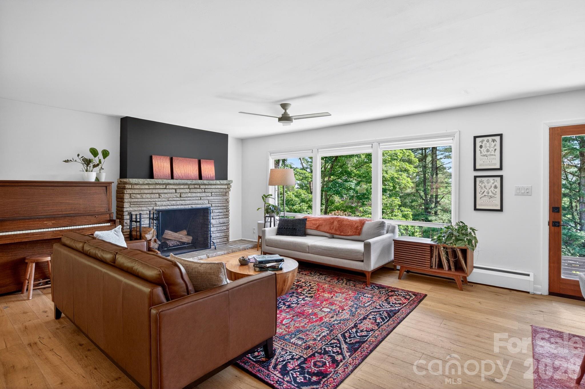 Cool stone fireplace - 301 Stratford Road, Asheville