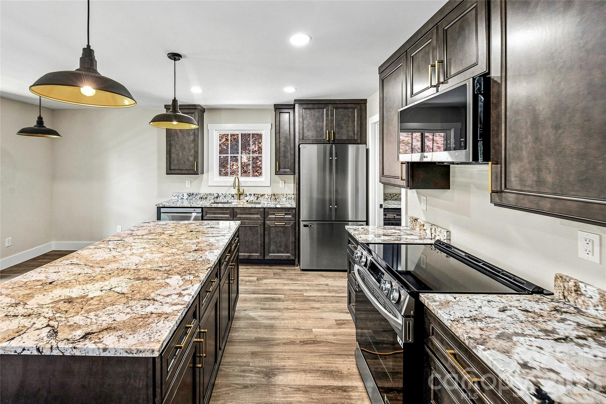 Kitchen with oversized island - 87 Catatoga Trail, Marion