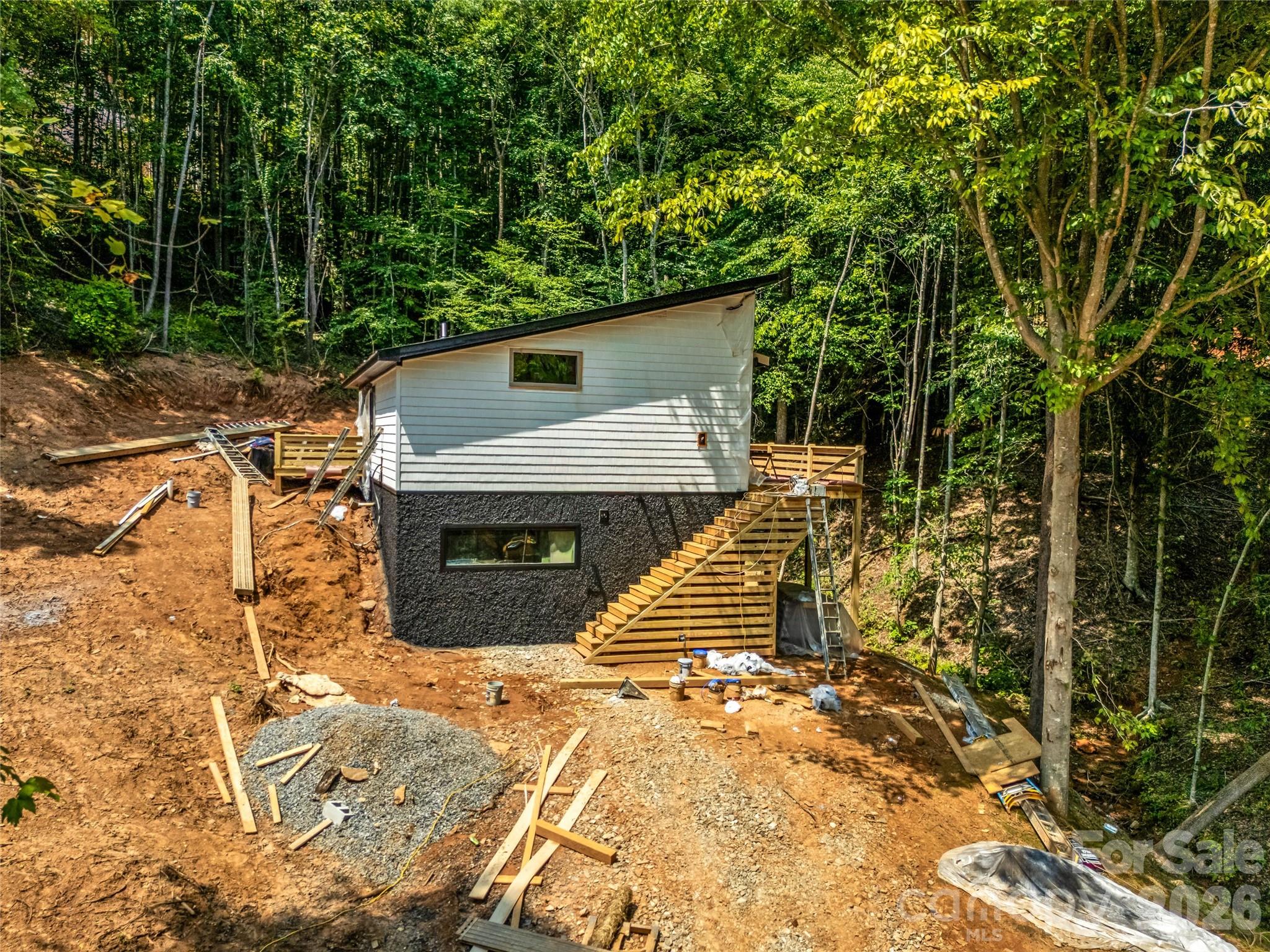 Aerial view of home and wooded setting - 119 Catatoga Trail, Marion