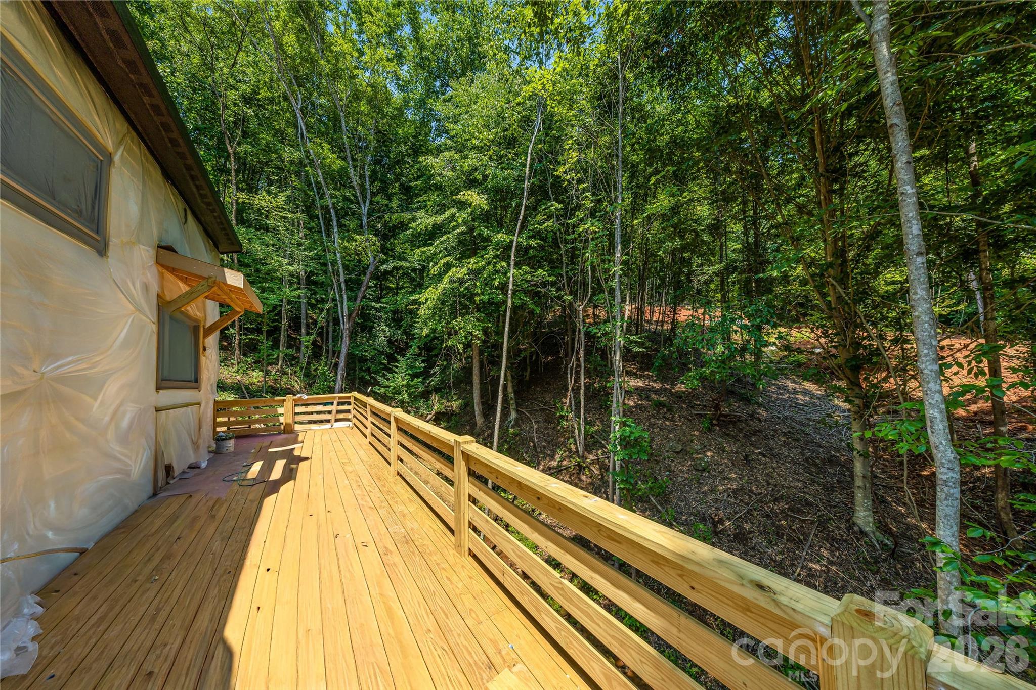 Expansive deck overlooking wooded setting - 119 Catatoga Trail, Marion