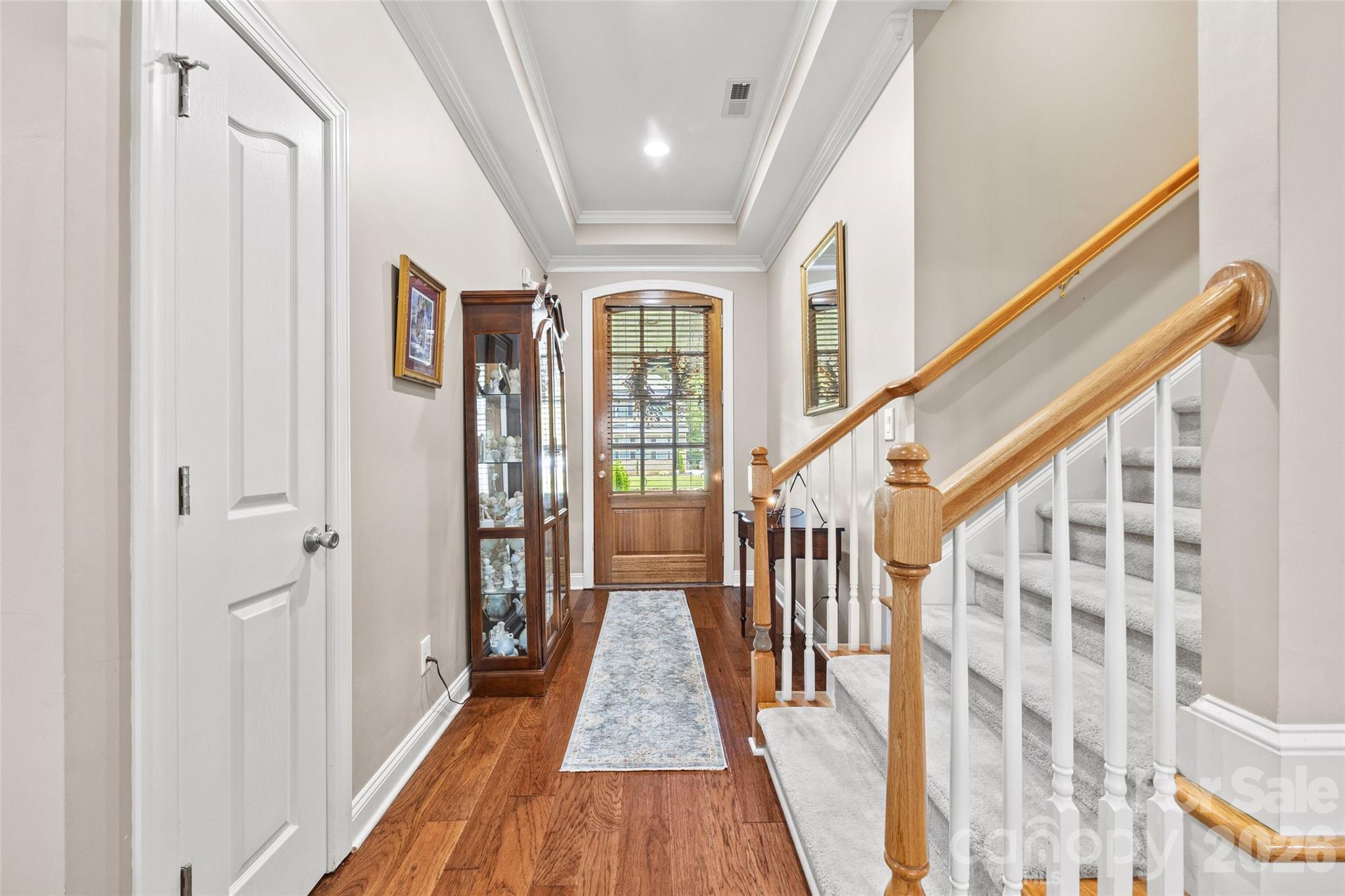 Foyer with steps leading to the Bonus Room - 771 Cherry Hills Place, Rock Hill