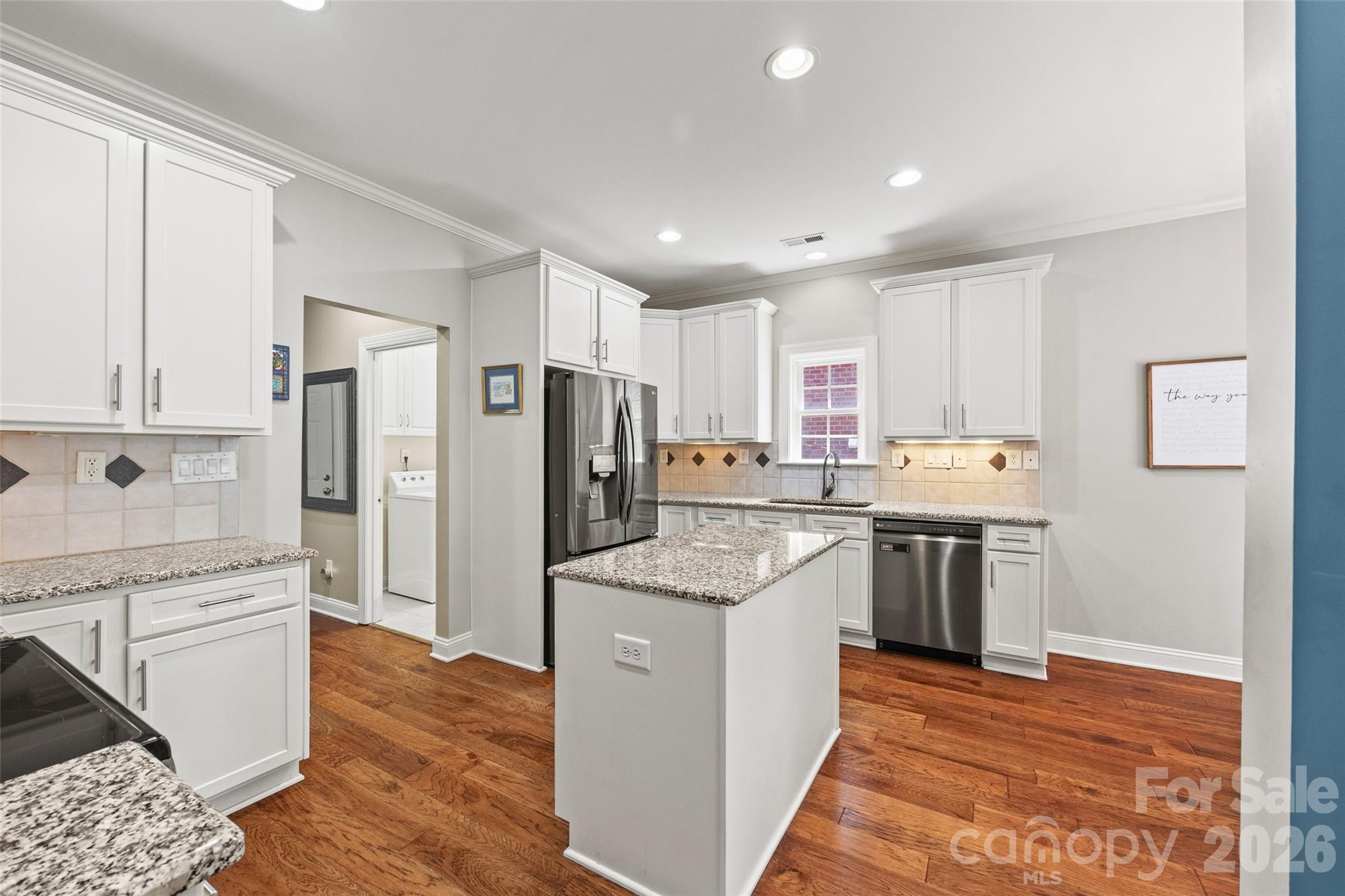 Updated kitchen with refaced cabinets and pull out drawers in the Island. One additional pull out drawer and pull out trash can - 771 Cherry Hills Place, Rock Hill