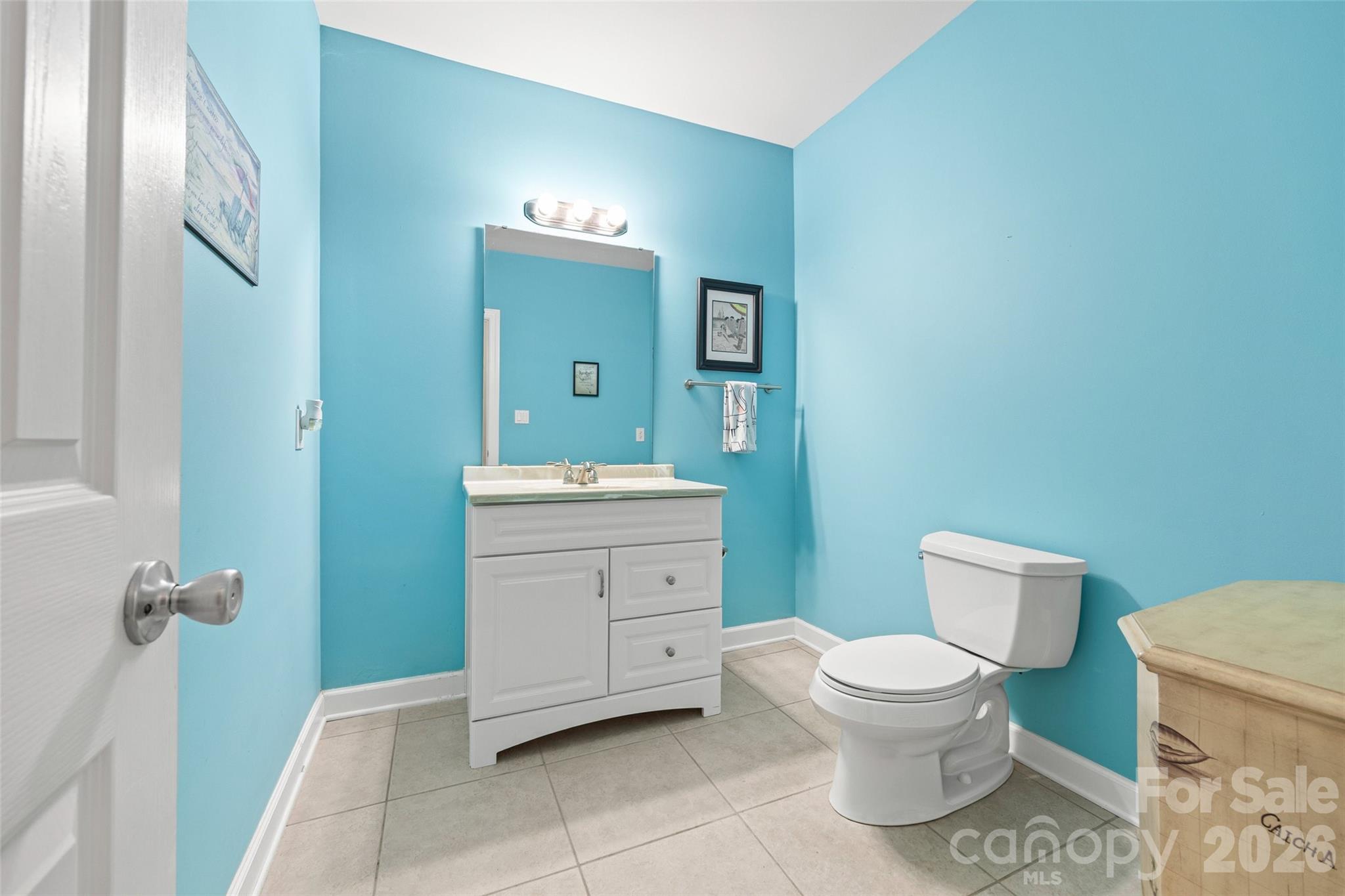 Convenient half bath on the basement level. Large enough that a shower could be added. This could actually be a second living space if needed. - 771 Cherry Hills Place, Rock Hill