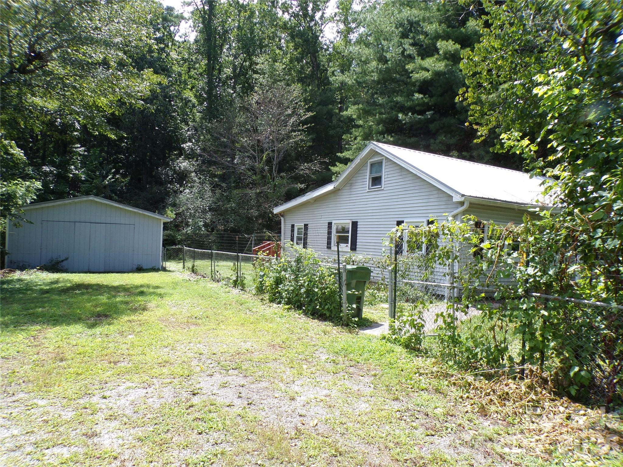 Driveway and left side view - 2131 Somerset Drive, Hendersonville
