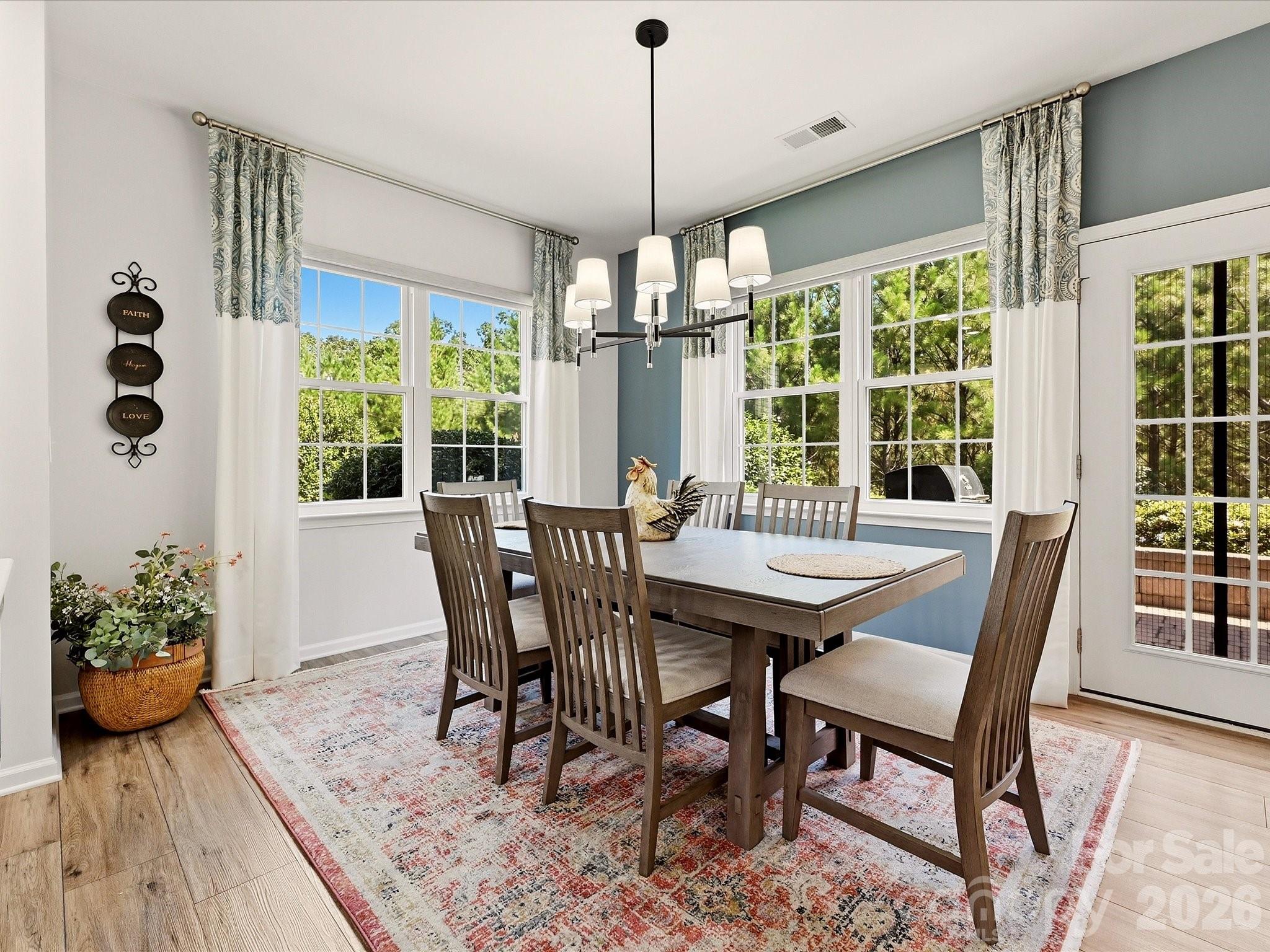 Large Breakfast Room with Wide Plank Flooring, Custom Remote Shades, Access to Patio - 5060 Big Bend Drive, Lancaster