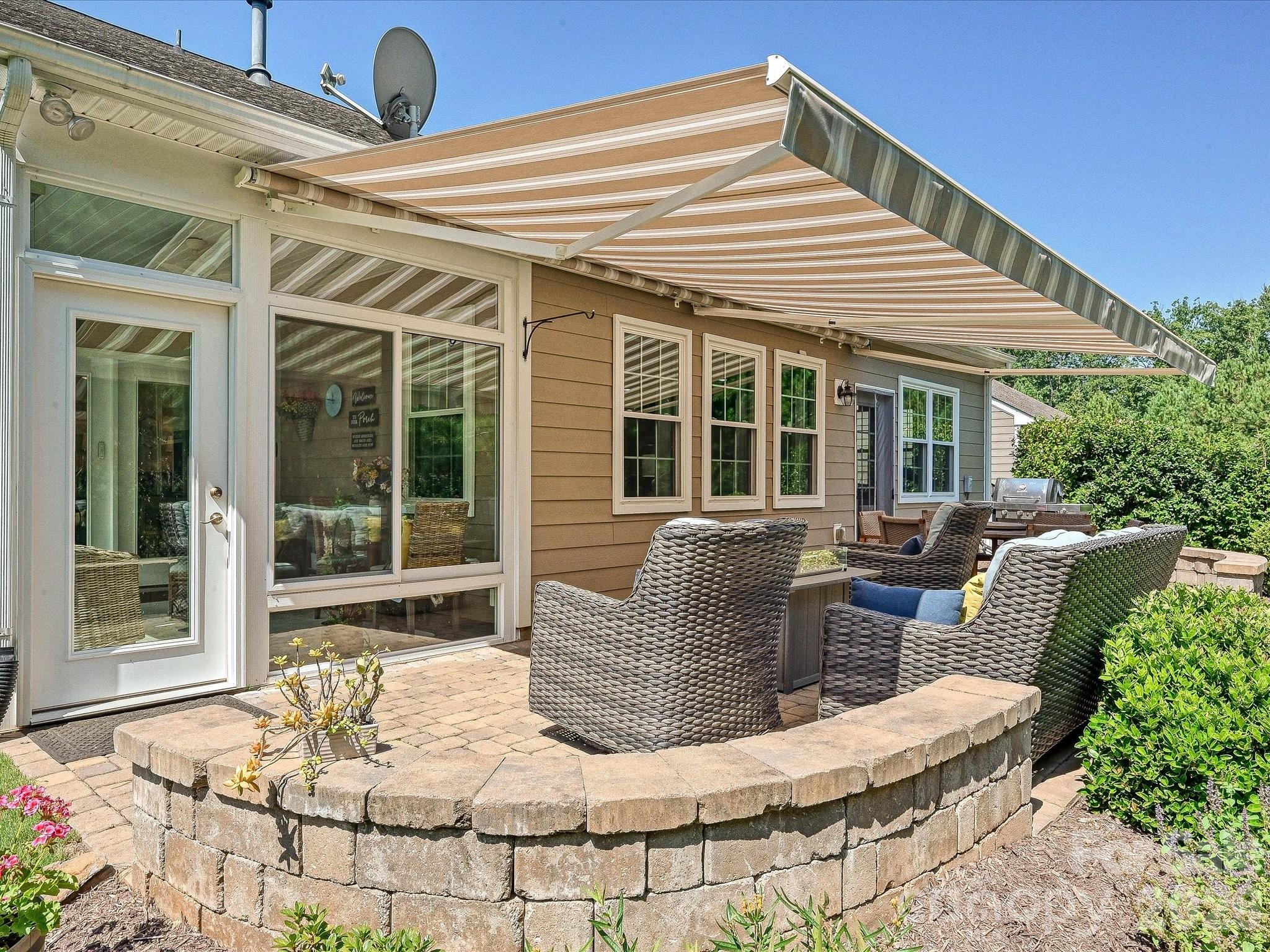 Awning over Patio is 23 Feet! Paver Patio with Two Bench Walls - 5060 Big Bend Drive, Lancaster