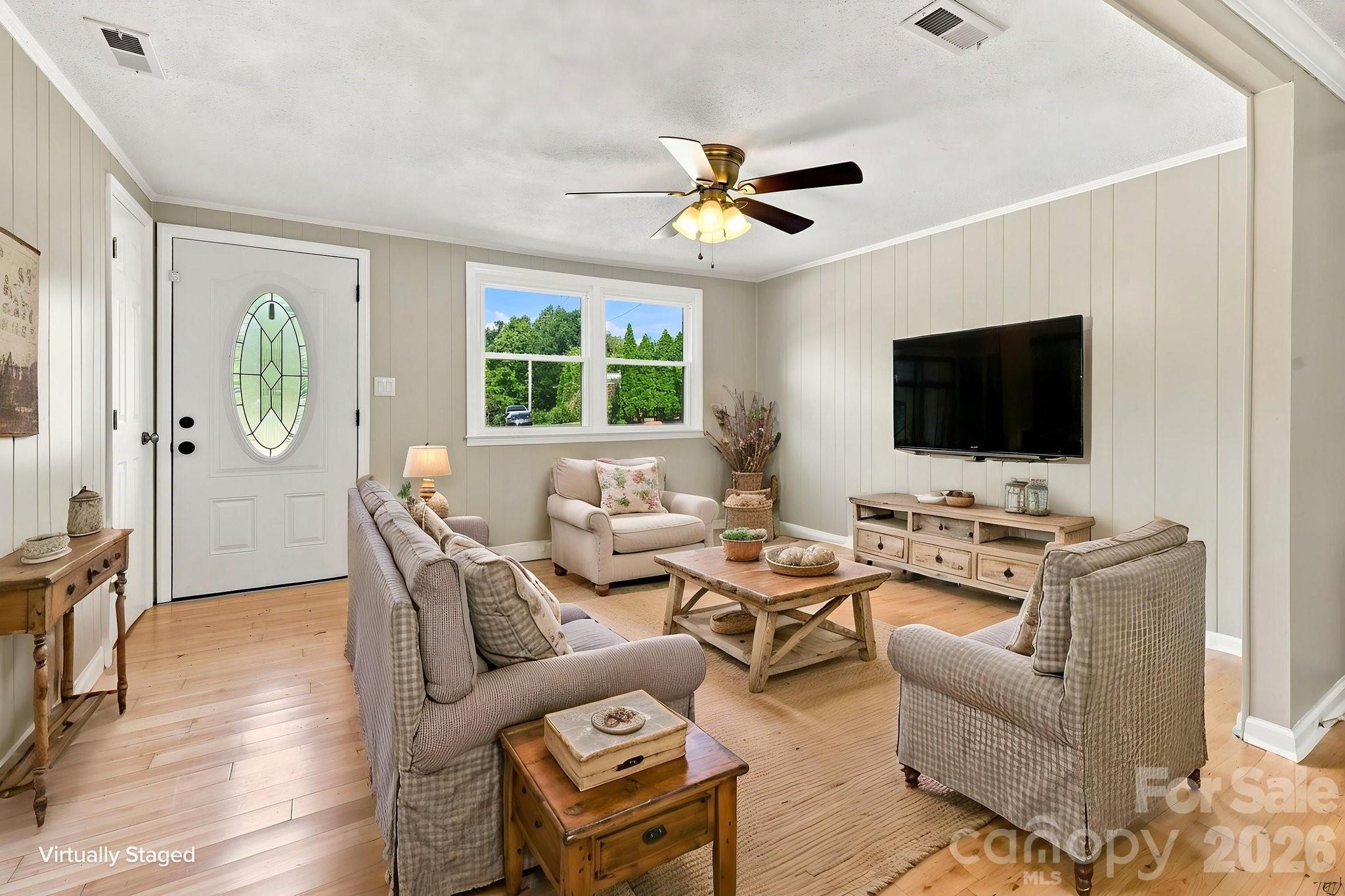 Living Room virtually staged - 1021 S Caldwell Avenue, Newton