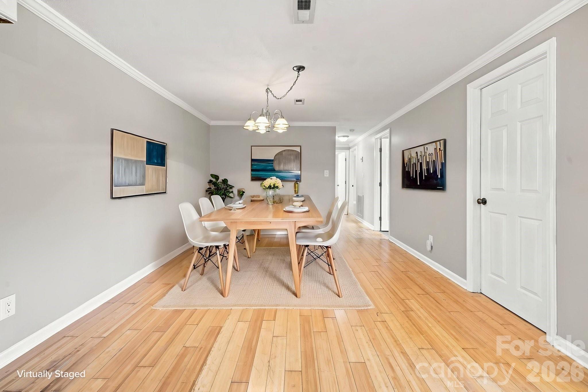 Dining Room virtually staged - 1021 S Caldwell Avenue, Newton