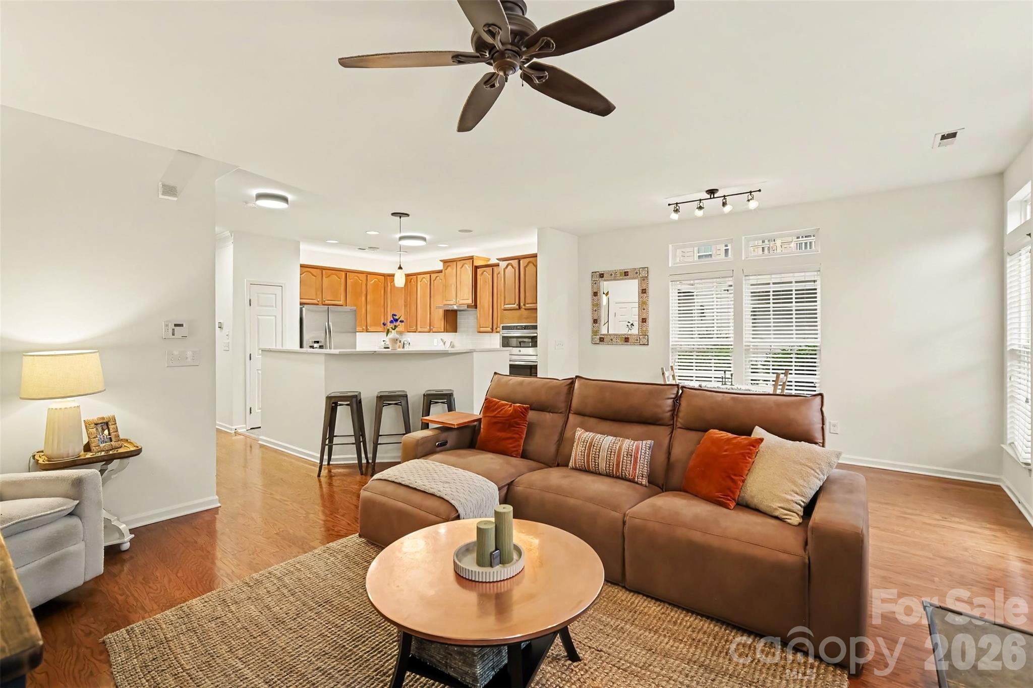 Family room flooded with morning light - 438 Magnolia Street, Davidson