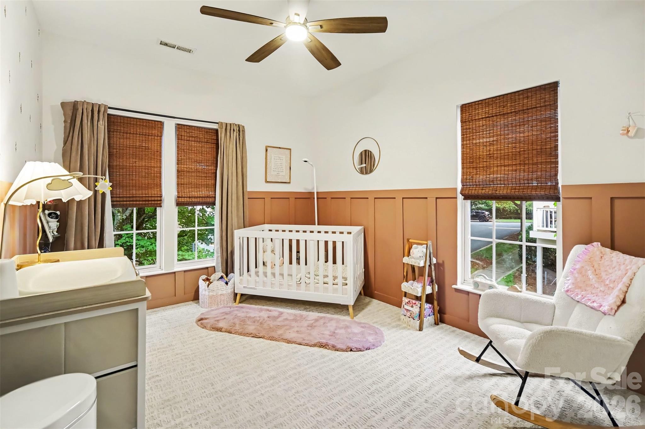 Adorable nursary but wood paneling and carpet would be beautiful as a guest room or older child's room also. Carpet is 1 year old - 438 Magnolia Street, Davidson
