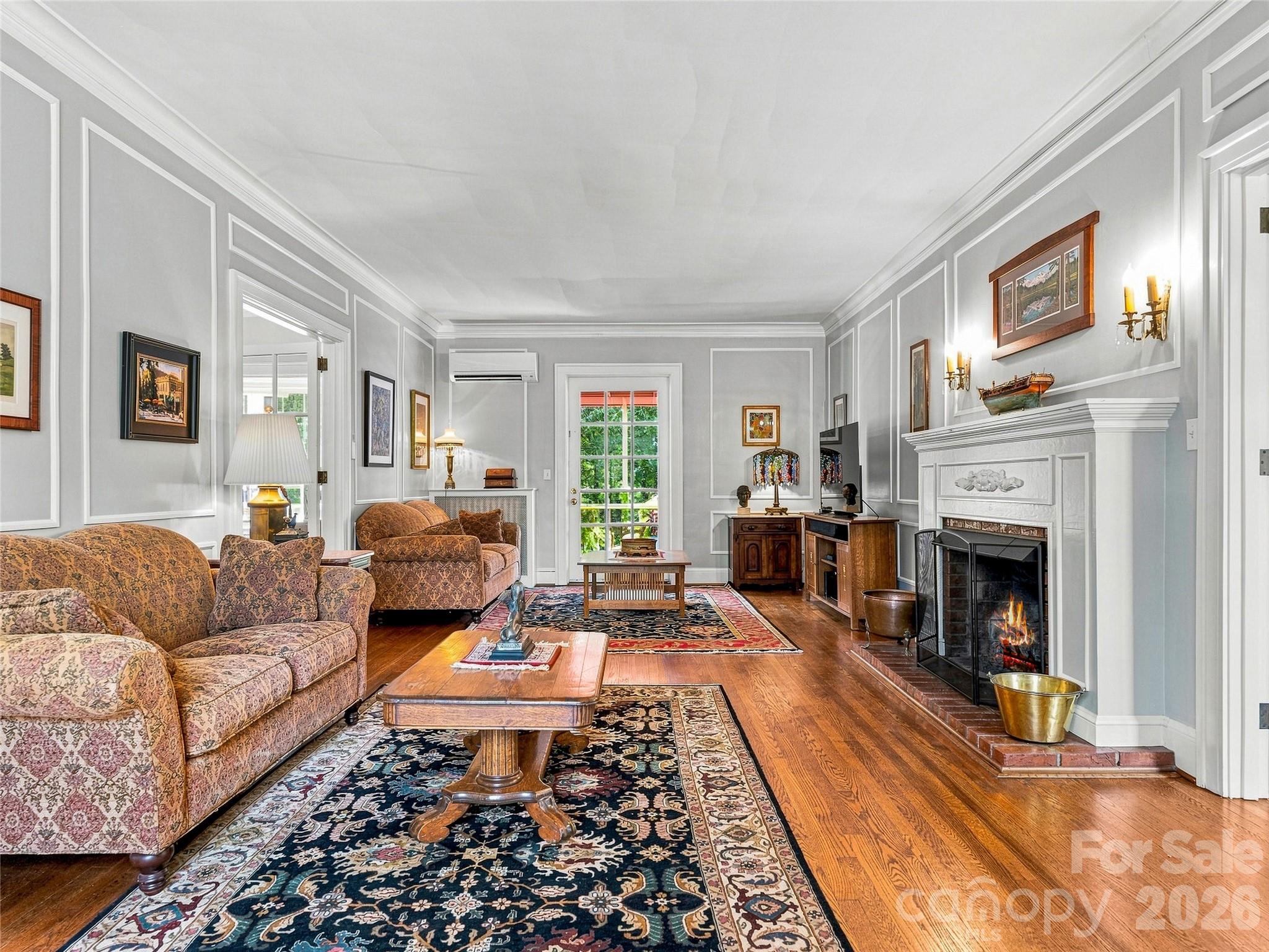 Inviting living room with fireplace and classic millwork. - 14 Griffing Boulevard, Asheville