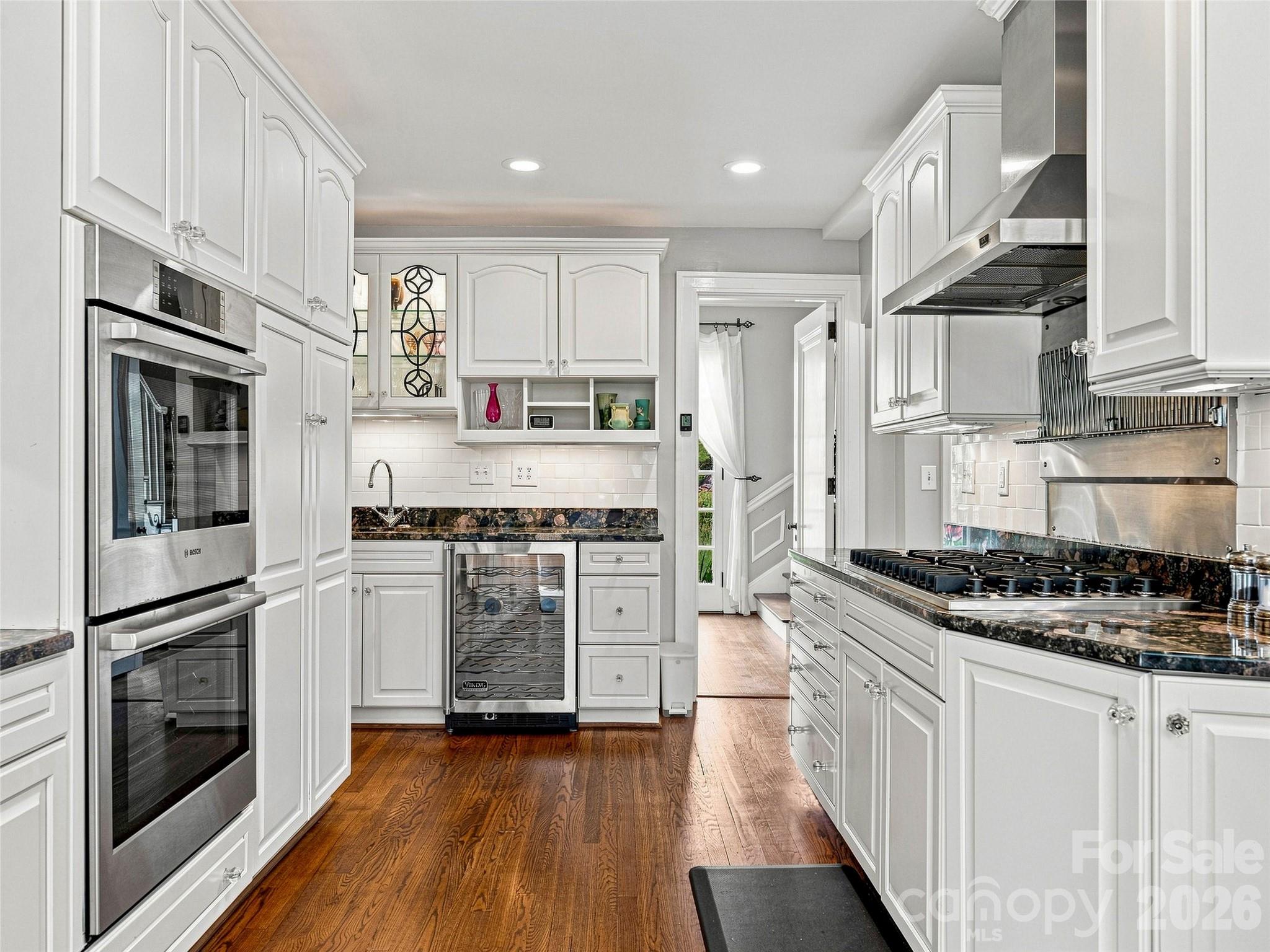 Bright, well appointed kitchen with abundant cabinetry and stainless appliances - 14 Griffing Boulevard, Asheville