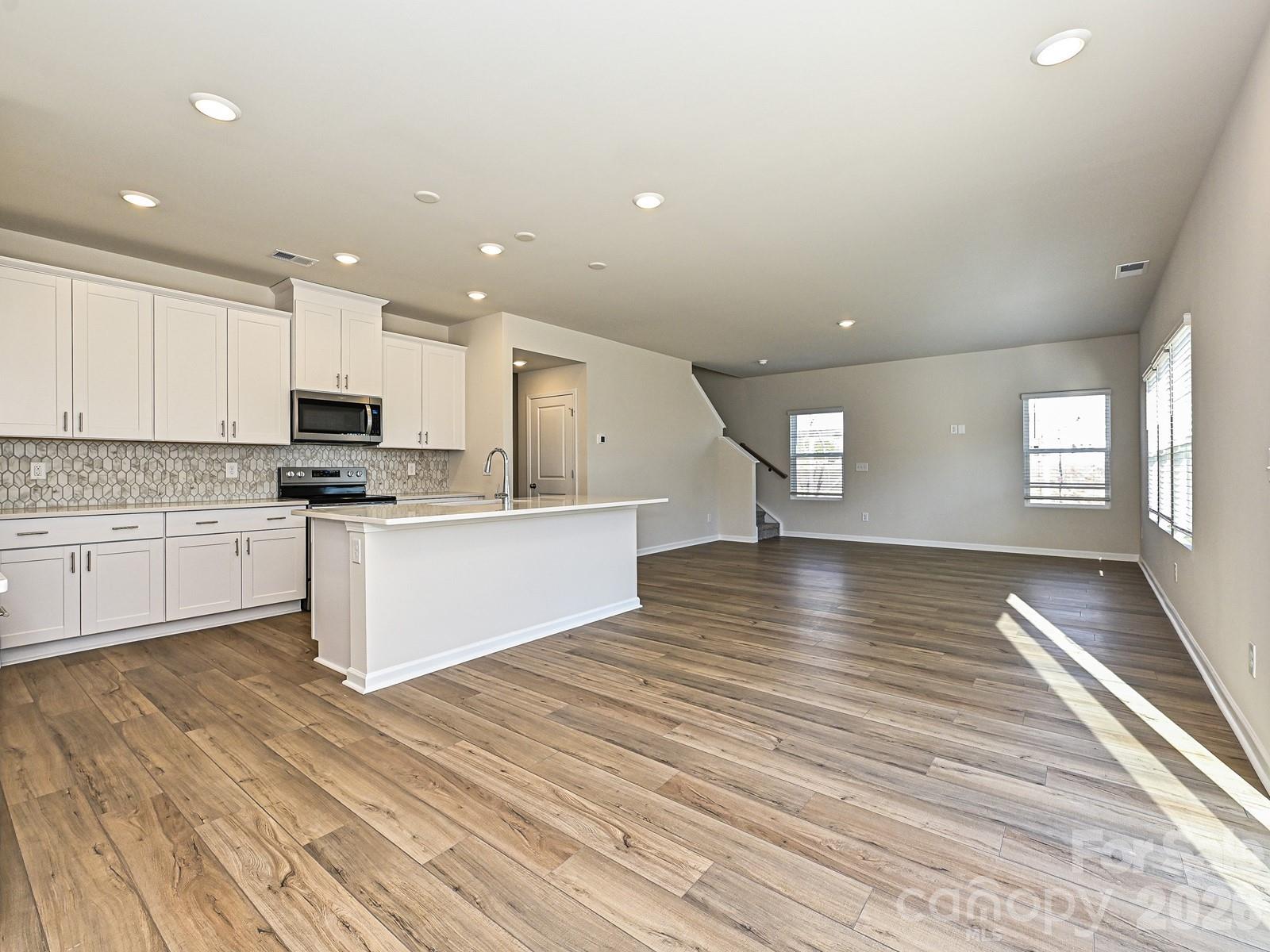 Photo is not of the actual home, but is an inspirational photo of builder’s model home and may depict options, furnishings, and/or decorator features that are not included. - 1601 Harper Landing Boulevard, Stanley
