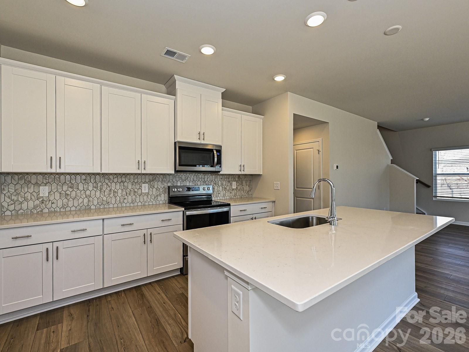 Photo is not of the actual home, but is an inspirational photo of builder’s model home and may depict options, furnishings, and/or decorator features that are not included. - 1601 Harper Landing Boulevard, Stanley