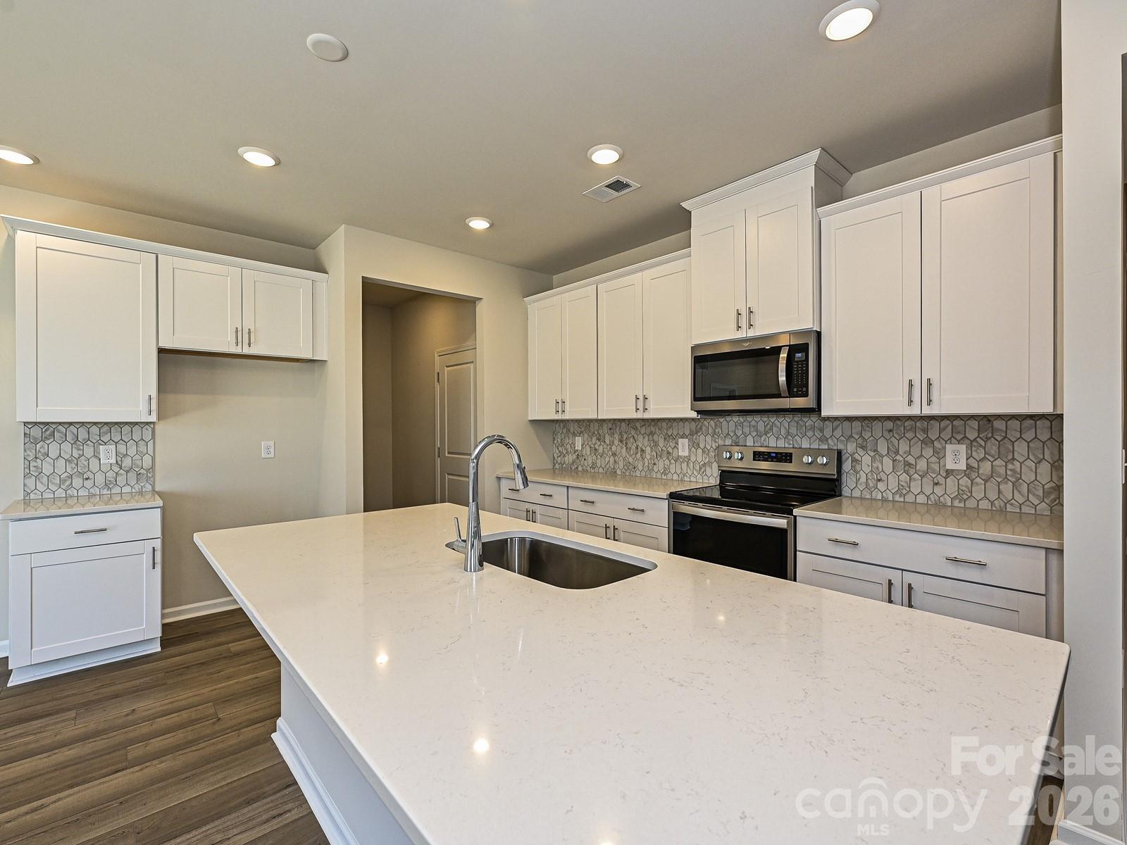 Photo is not of the actual home, but is an inspirational photo of builder’s model home and may depict options, furnishings, and/or decorator features that are not included. - 1601 Harper Landing Boulevard, Stanley