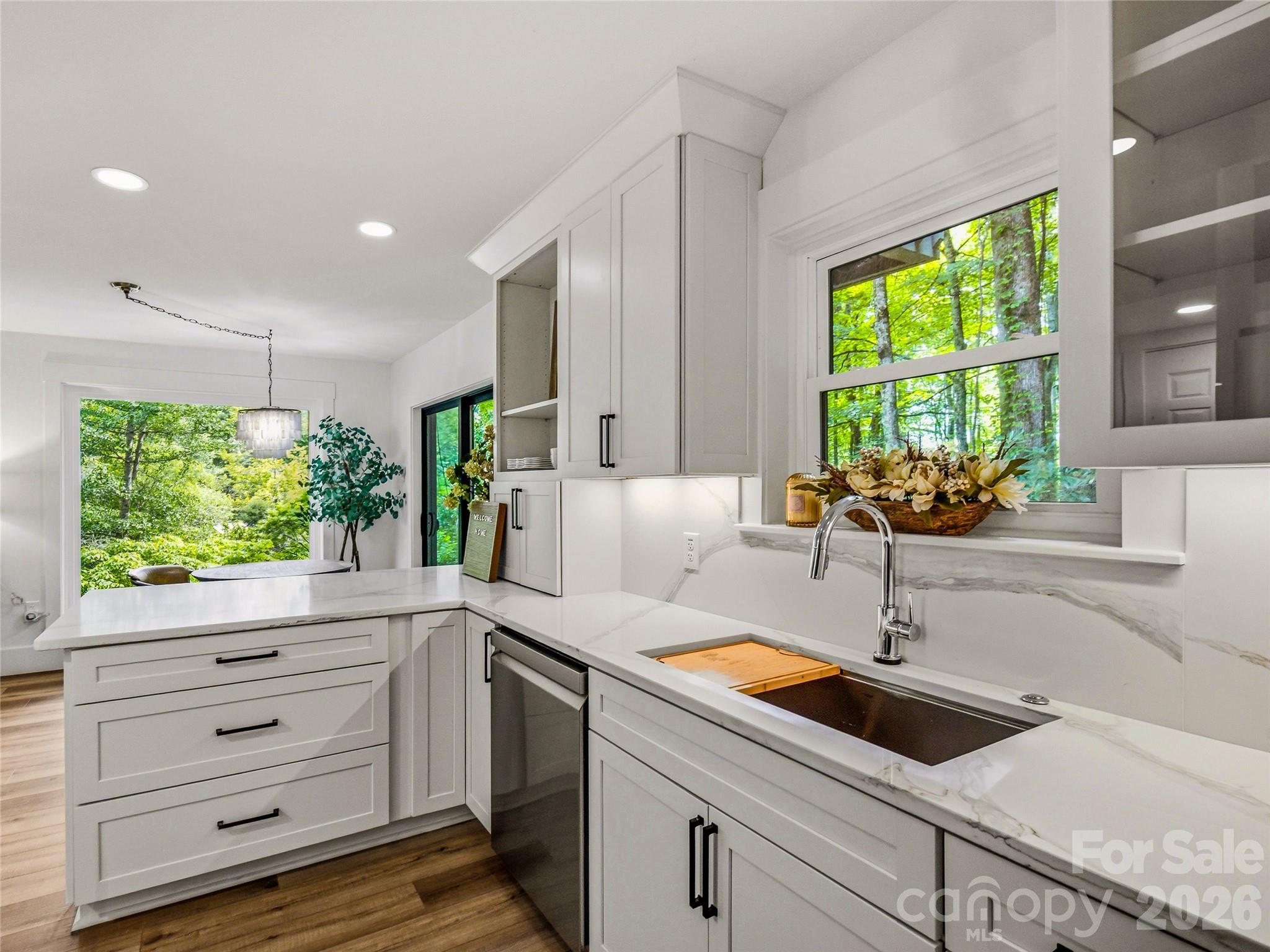 Kitchen with soft close drawers and Ferguson plumbing fixtures. - 81 Summer Trees Lane, Burnsville