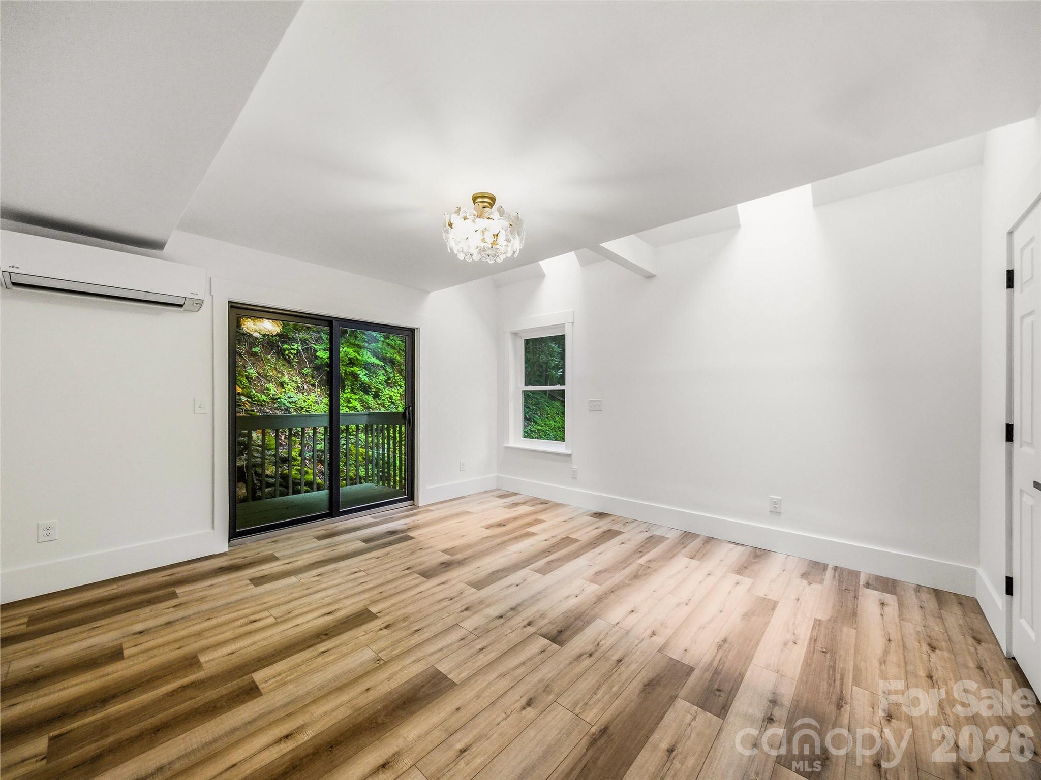 Primary Suite with sitting area, ensuite and double closets. Skylights and desk adjoin for private enjoyment. - 81 Summer Trees Lane, Burnsville