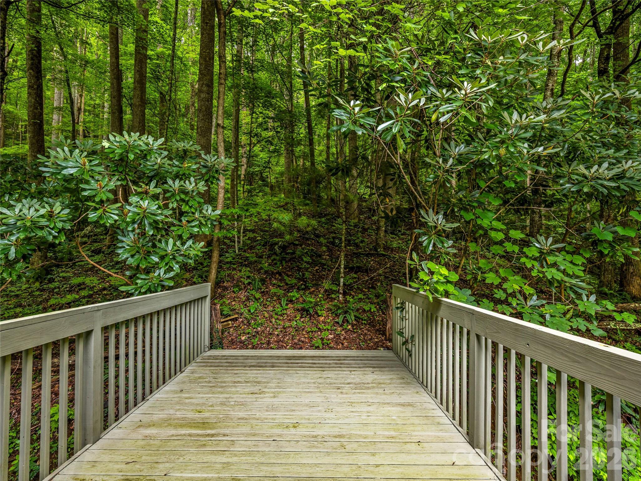 Loft deck enters to the peaceful forest. - 81 Summer Trees Lane, Burnsville