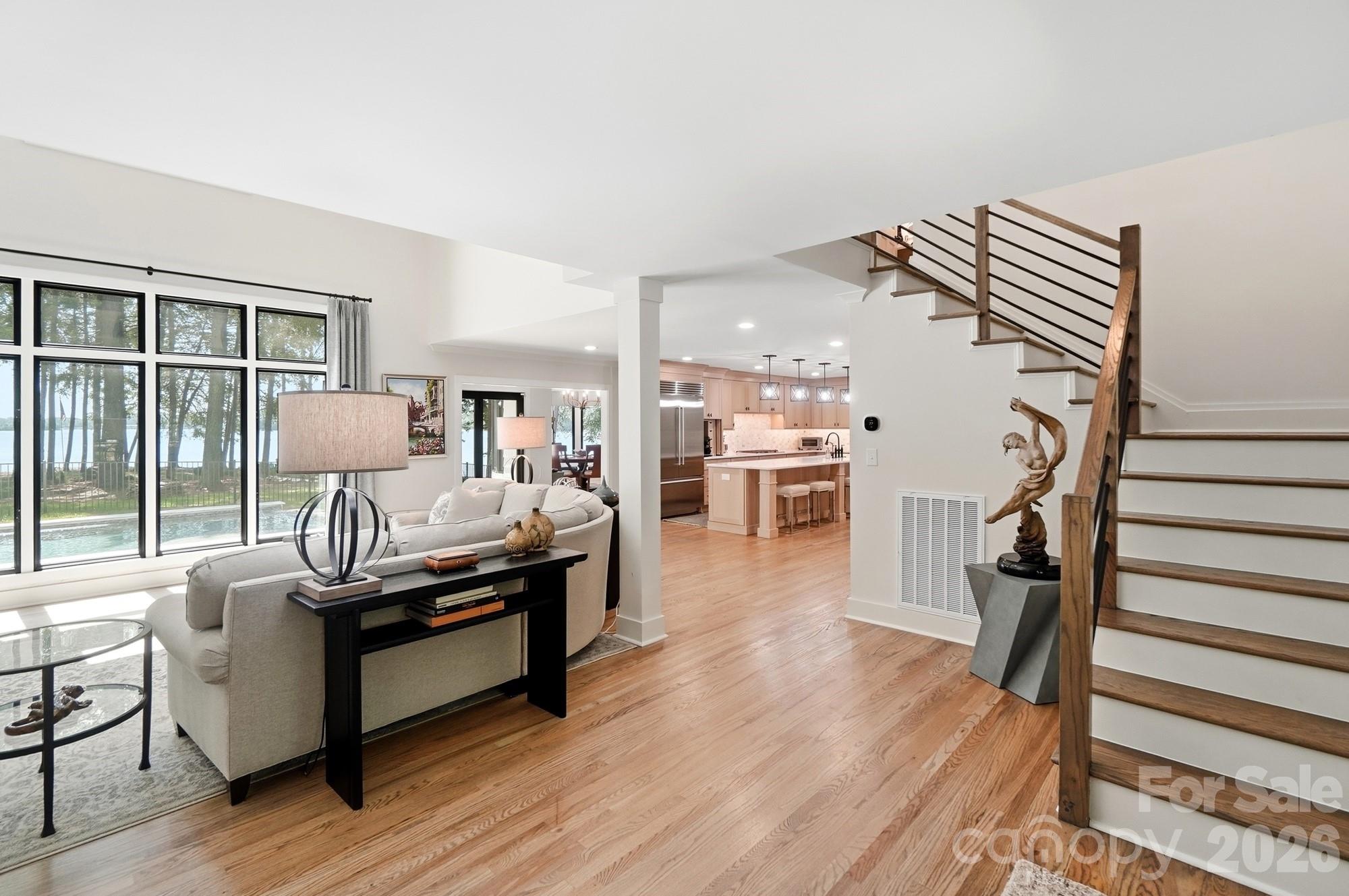 Great room with huge views, soaring ceilings, open to kitchen - 9265 Belle Pines Court, Sherrills Ford