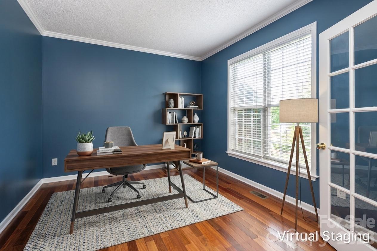 Main-level front room with French doors, hardwood floors and windows; works as a home office, study or sitting room. Under 10 minutes to Asheville Regional Airport. - 48 Brownstone Court, Fletcher