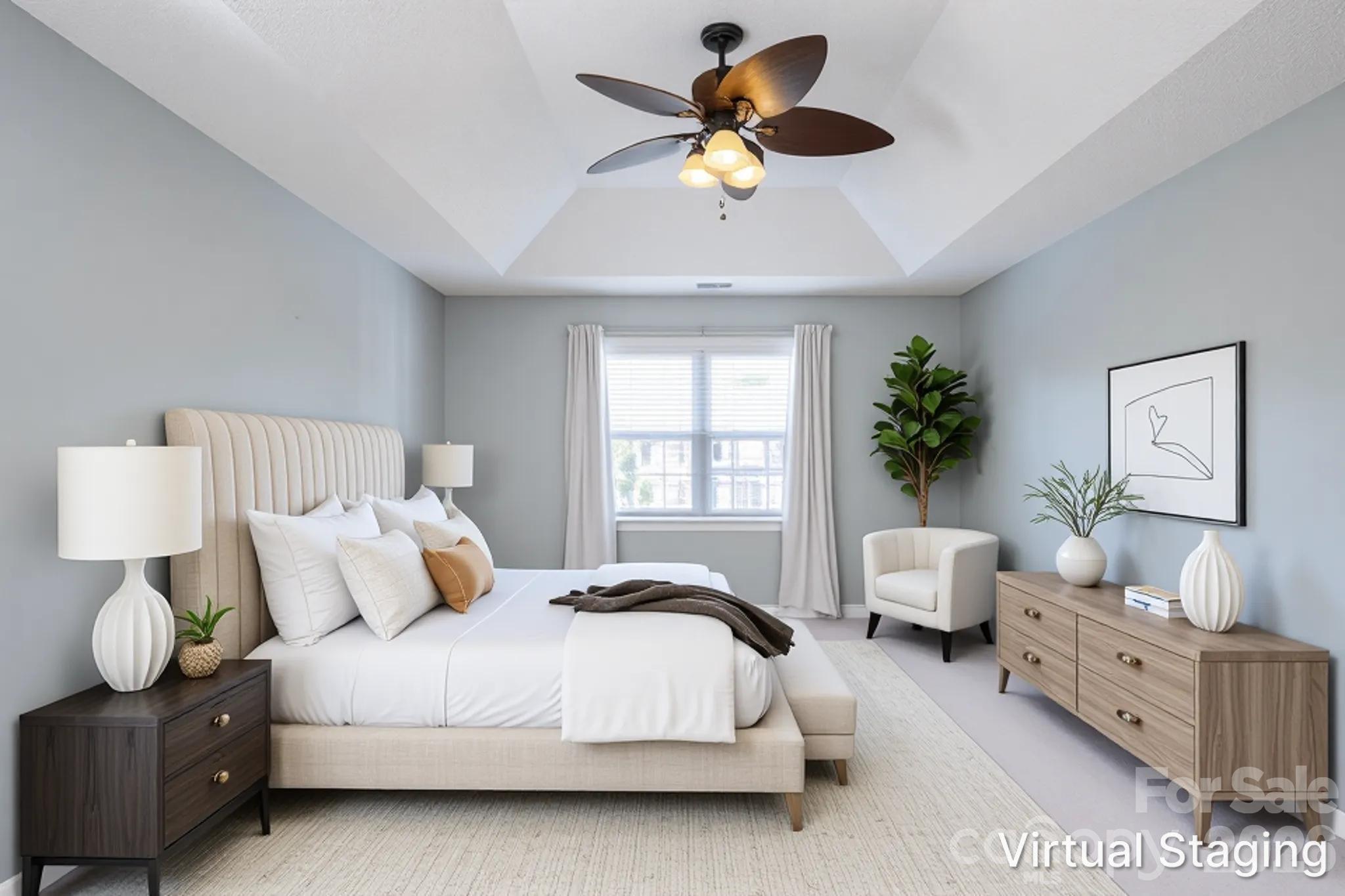 Upstairs primary suite with tray ceiling, ceiling fan, walk-in closet and en-suite bath with soaking tub and separate shower. - 48 Brownstone Court, Fletcher