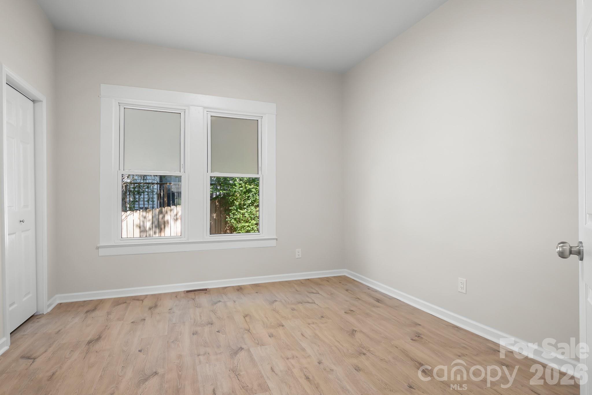Spacious primary bedroom with two closets. - 104 1st Avenue, China Grove